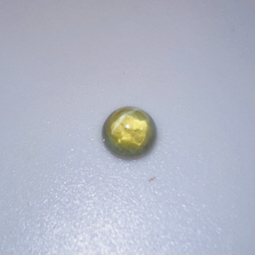 CHRYSOBERYL CATS EYE 5MM ROUND  0.80CTS image 3