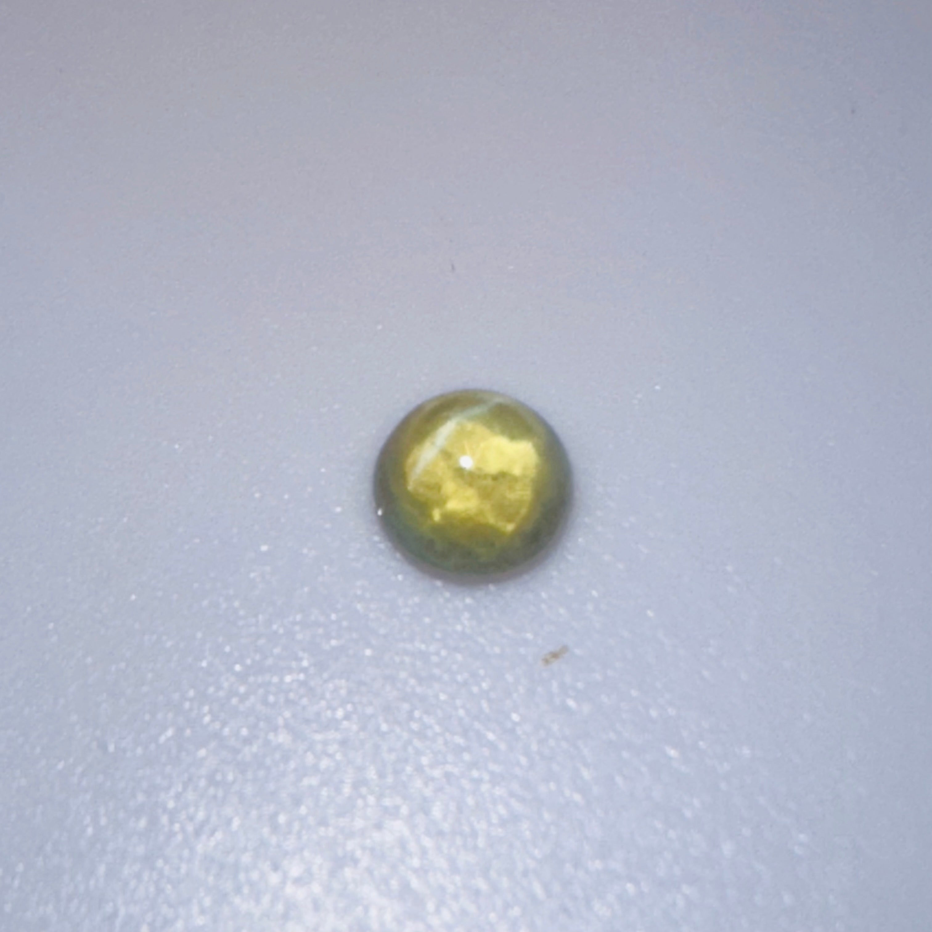 CHRYSOBERYL CATS EYE 5MM ROUND  0.80CTS image 3