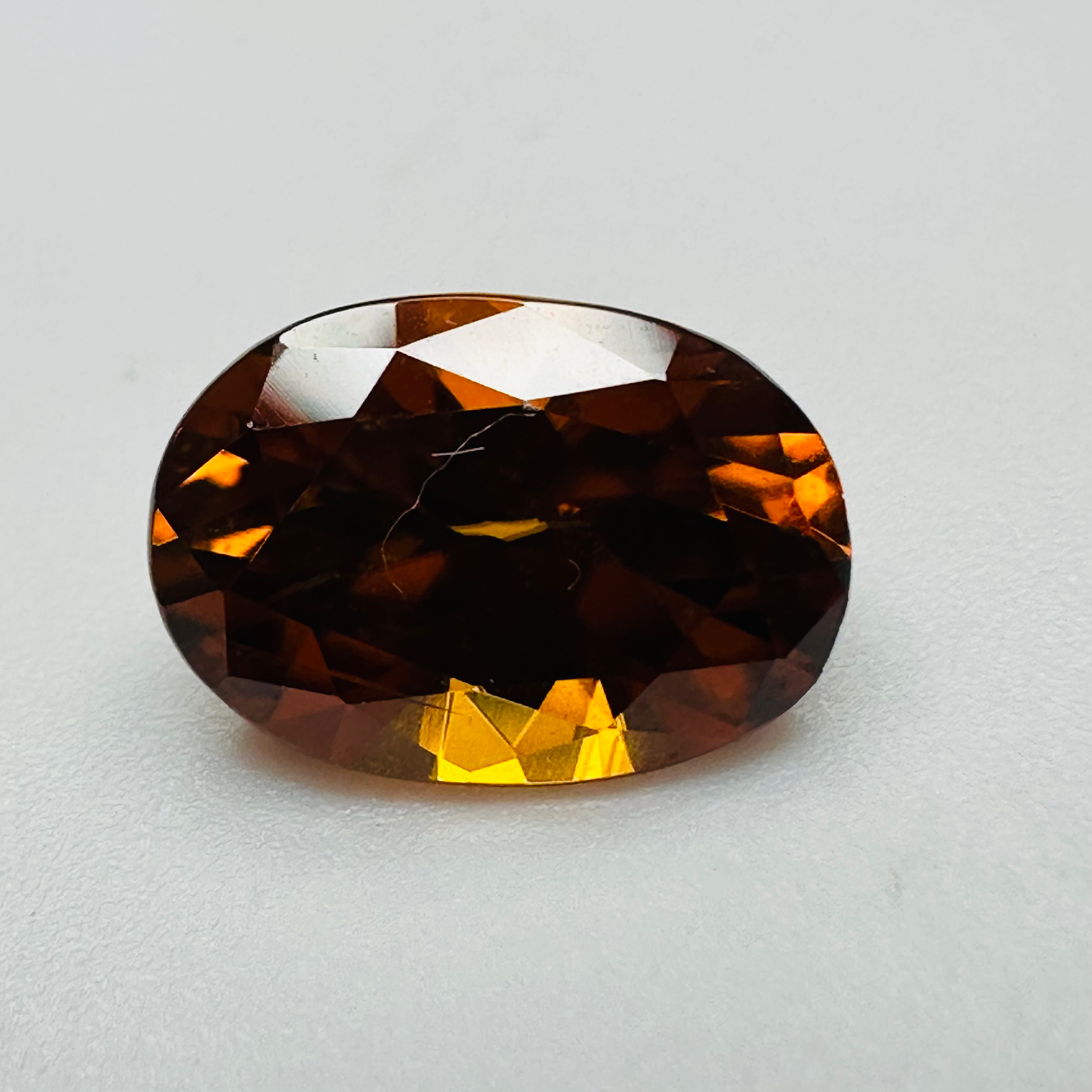 ZIRCON ORANGE OVAL 10.8MMX7.7MM  3.83CTS image 1