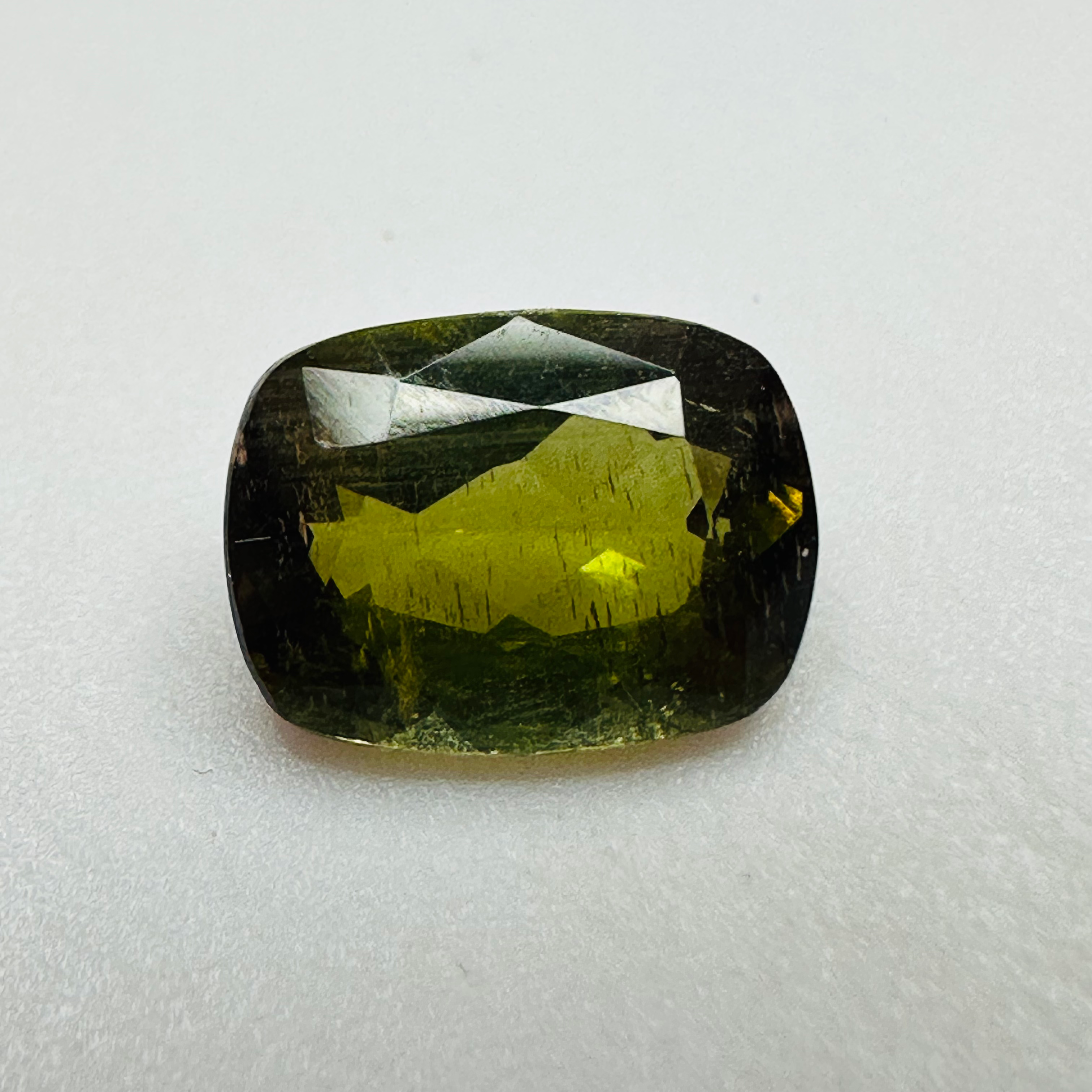 ANDALUSITE  TRAP CUT 8.5MMX6.5MM.  1.47CTS GREEN TO RED image 0