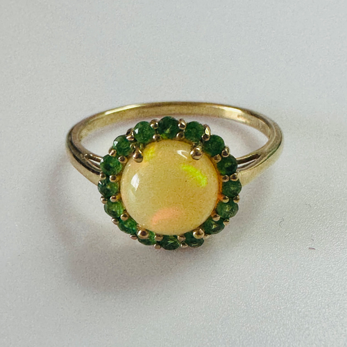 9CT FIRE OPAL AND GREEN GARNET RING SIZE R1/2 image 0