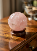 Rose quartz sphere on wood stand 45mm image 0