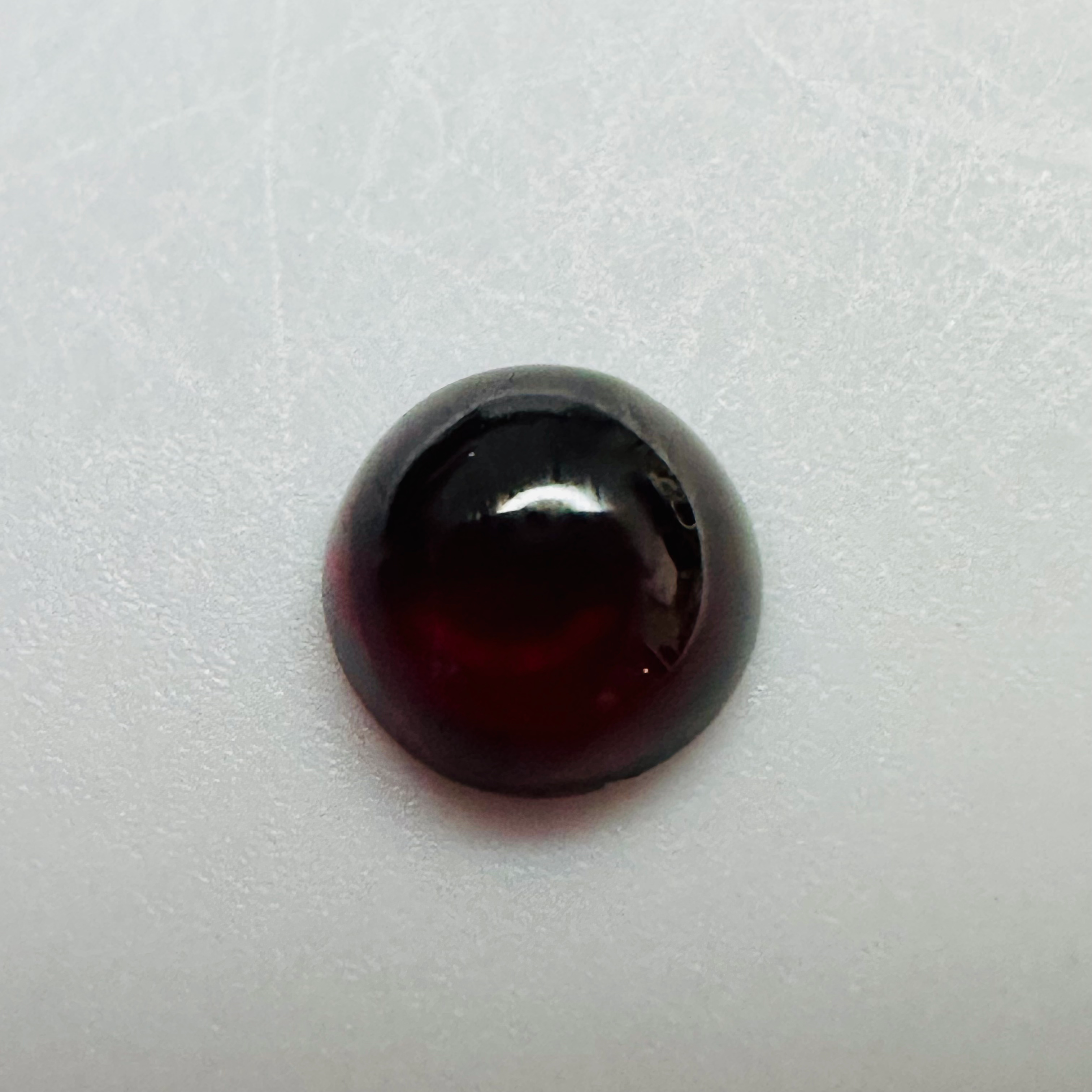 GARNET ROUND CAB 7MM.  1.96CTS image 4