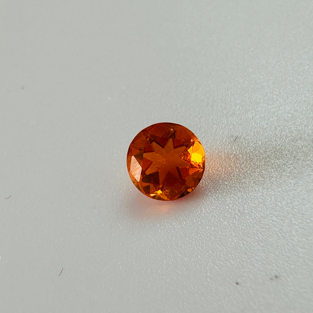 FIRE OPAL ROUND 5.3MM ROUND  0.37CTS image 0