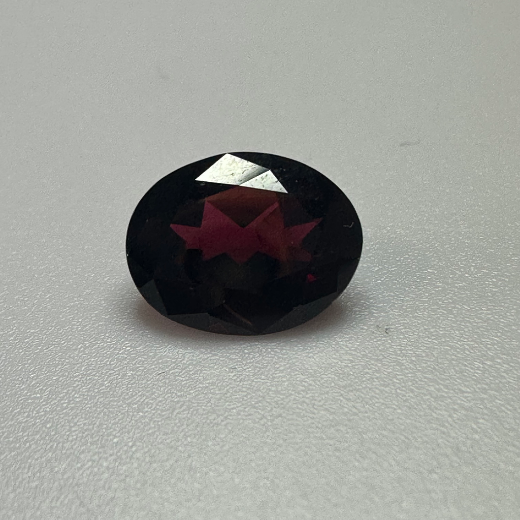 GARNET OVAL 10MMX8MM   3.03CTS image 1