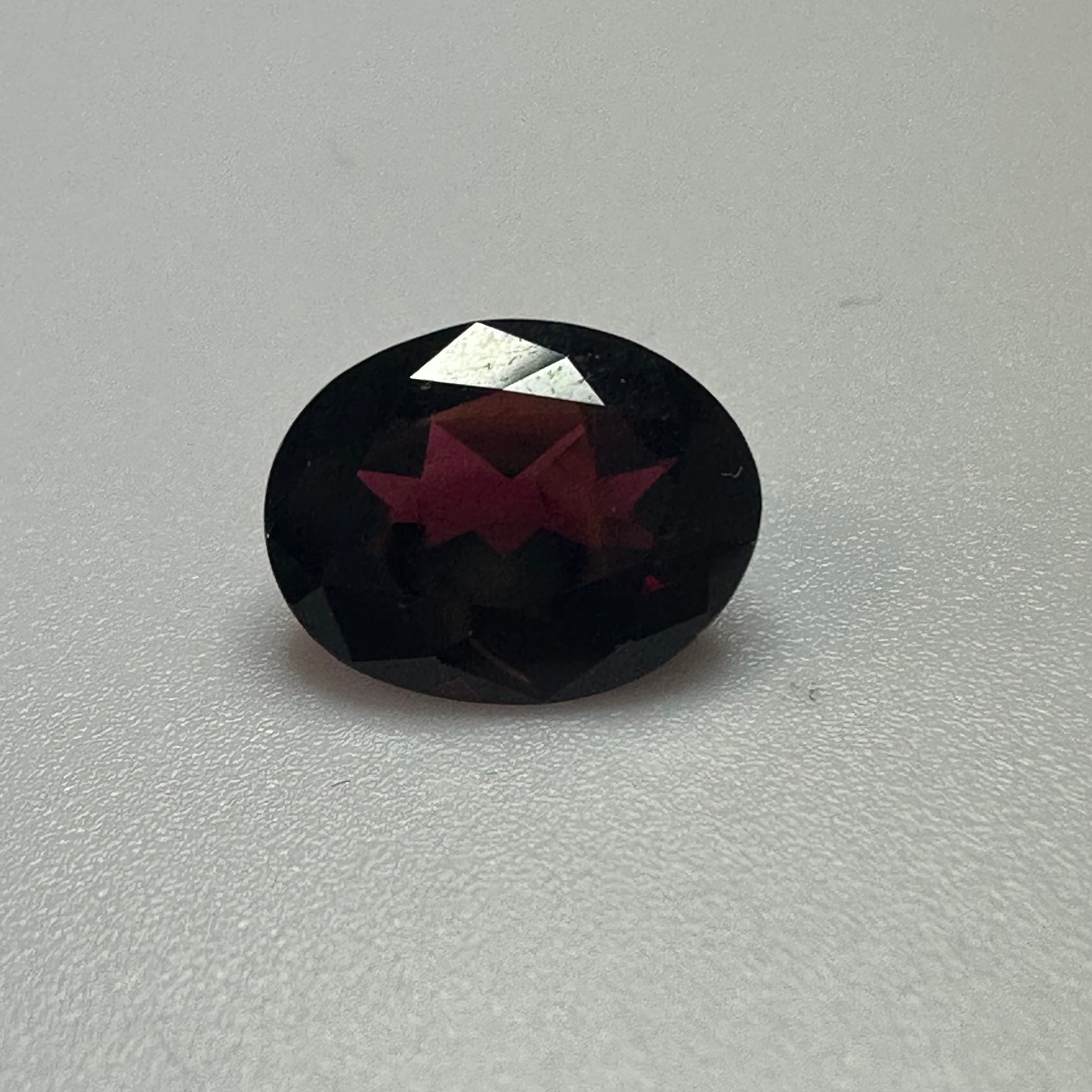 GARNET OVAL 10MMX8MM   3.03CTS image 1