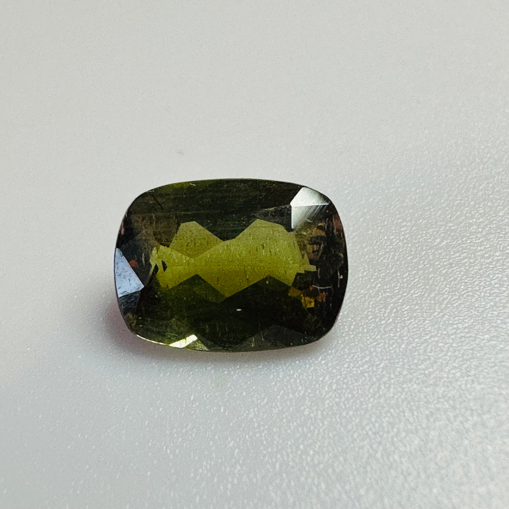 ANDALUSITE  TRAP CUT 8.5MMX6.5MM.  1.47CTS GREEN TO RED image 2