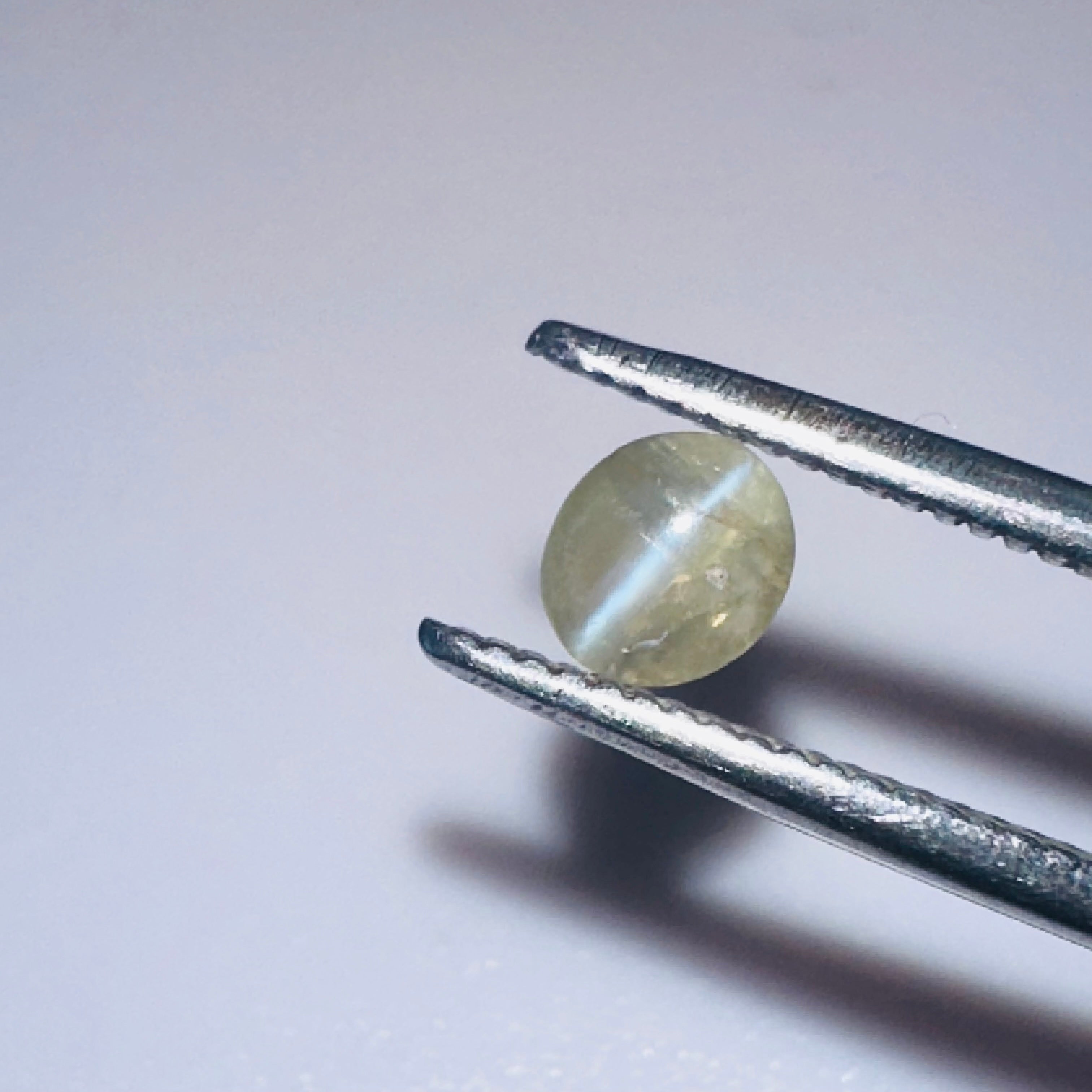 CHRYSOBERYL CATS EYE OVAL 4.5MMX4MM  0.39CTS image 0