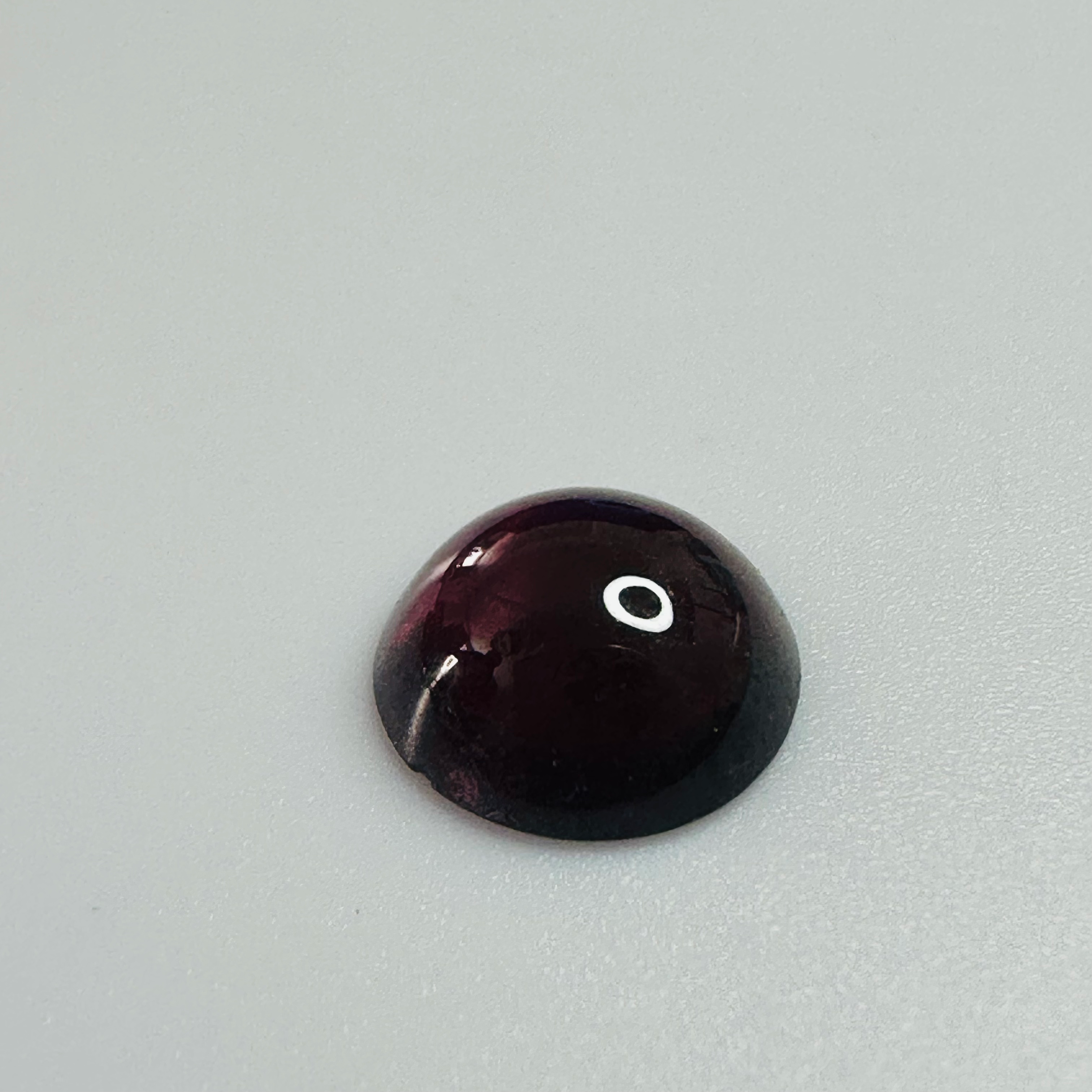 GARNET ROUND CAB 9.8MM 3.58CTS image 1