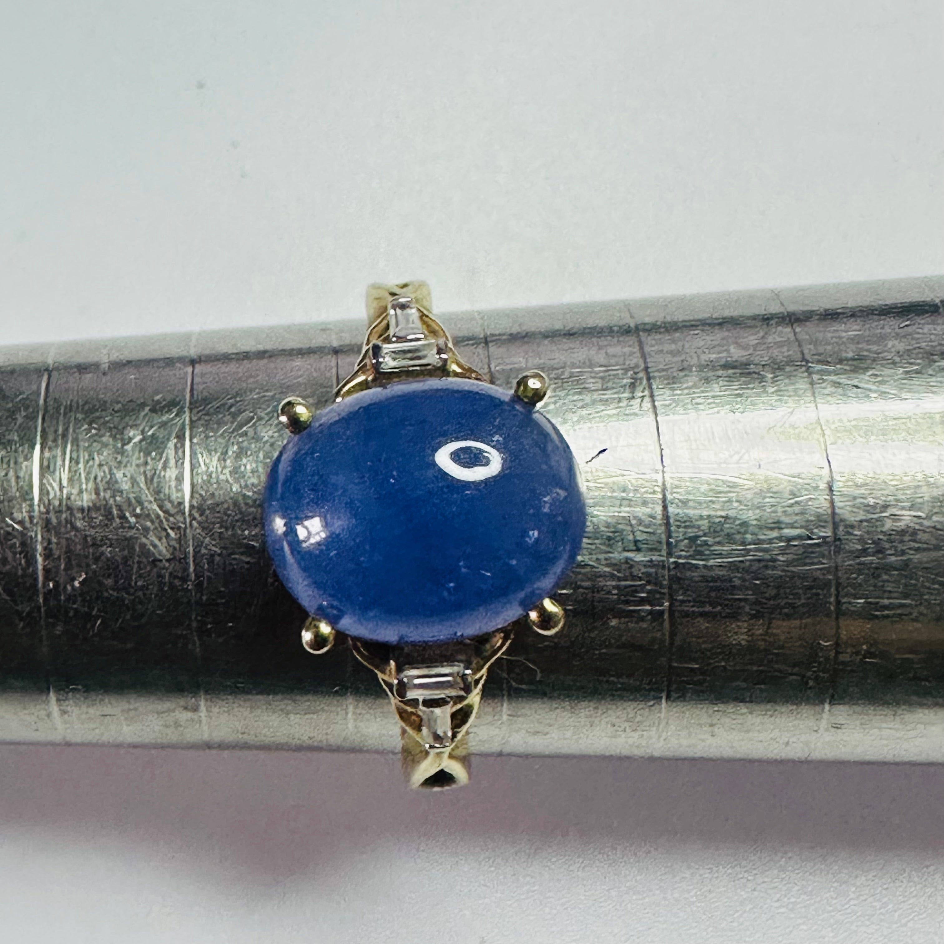 9ct gold Tanzanite cab 11mmx8.5mm  ring size P1/2 image 0