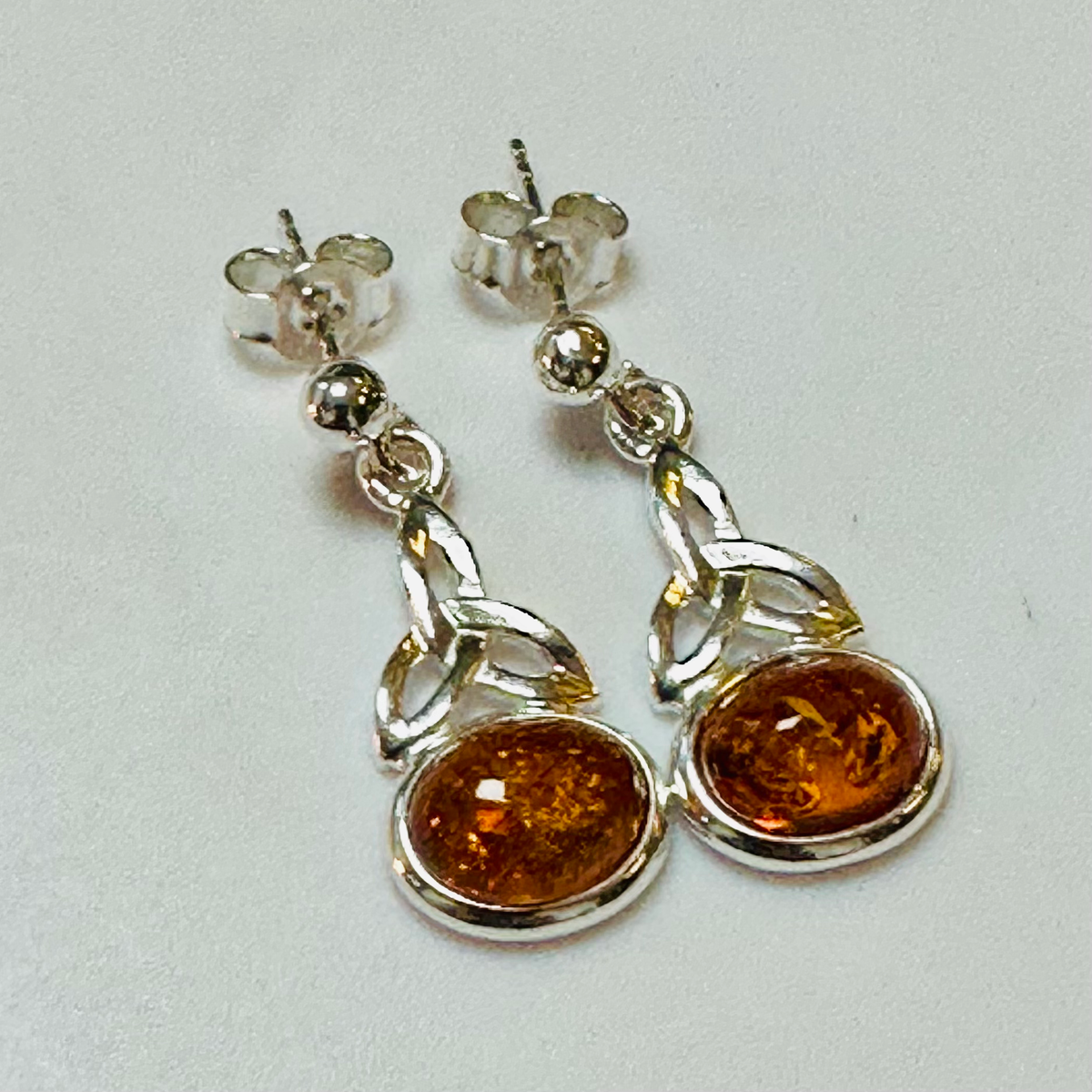 Sterling silver Amber Celtic knott earrings image 1
