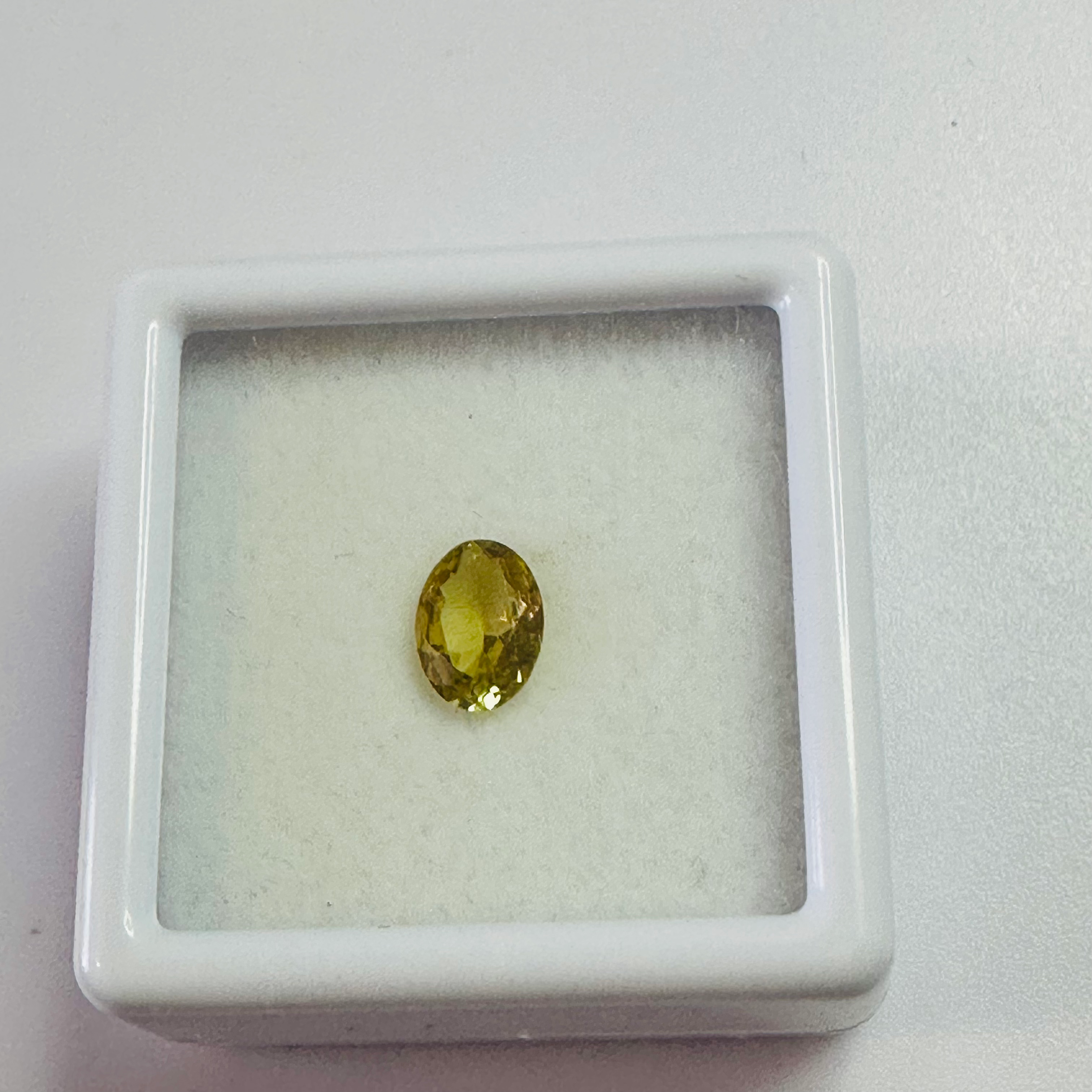 TOURMALINE YELLOW OVAL 6.6MMX4.8MM  0.62CTS image 1