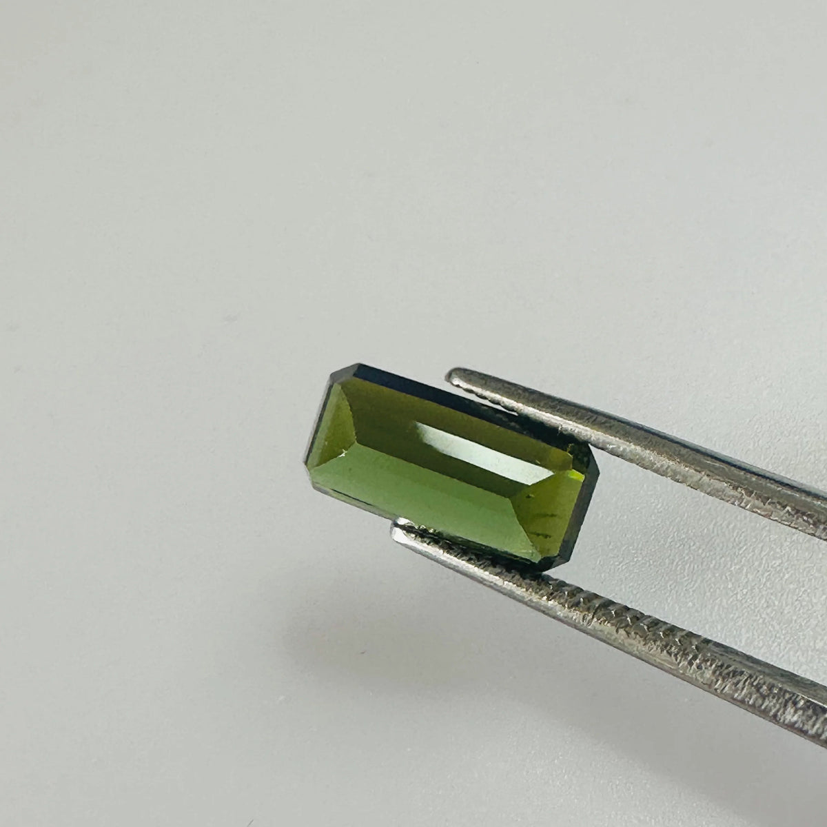 TOURMALINE GREEN LONG TRAP CUT  11MM.X 5MM   2.51CTS