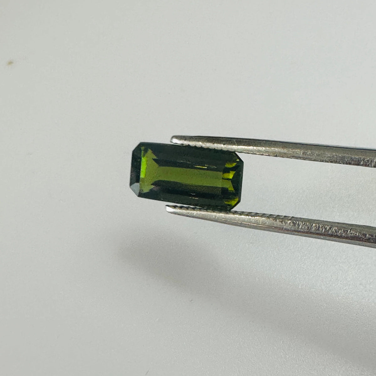 TOURMALINE GREEN LONG TRAP CUT  11MM.X 5MM   2.51CTS