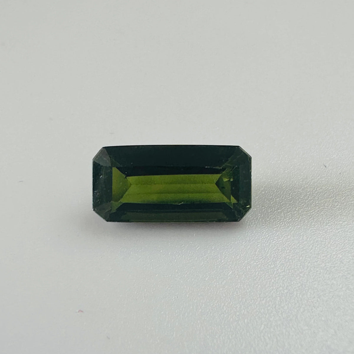 TOURMALINE GREEN LONG TRAP CUT  11MM.X 5MM   2.51CTS