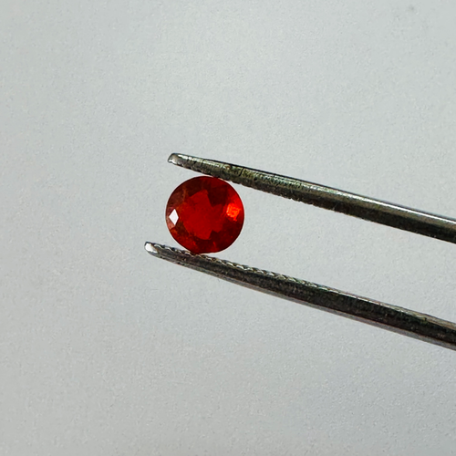 CHERRY RED FIRE OPAL ROUND 4.9MM ROUND  0.25CTS image 0