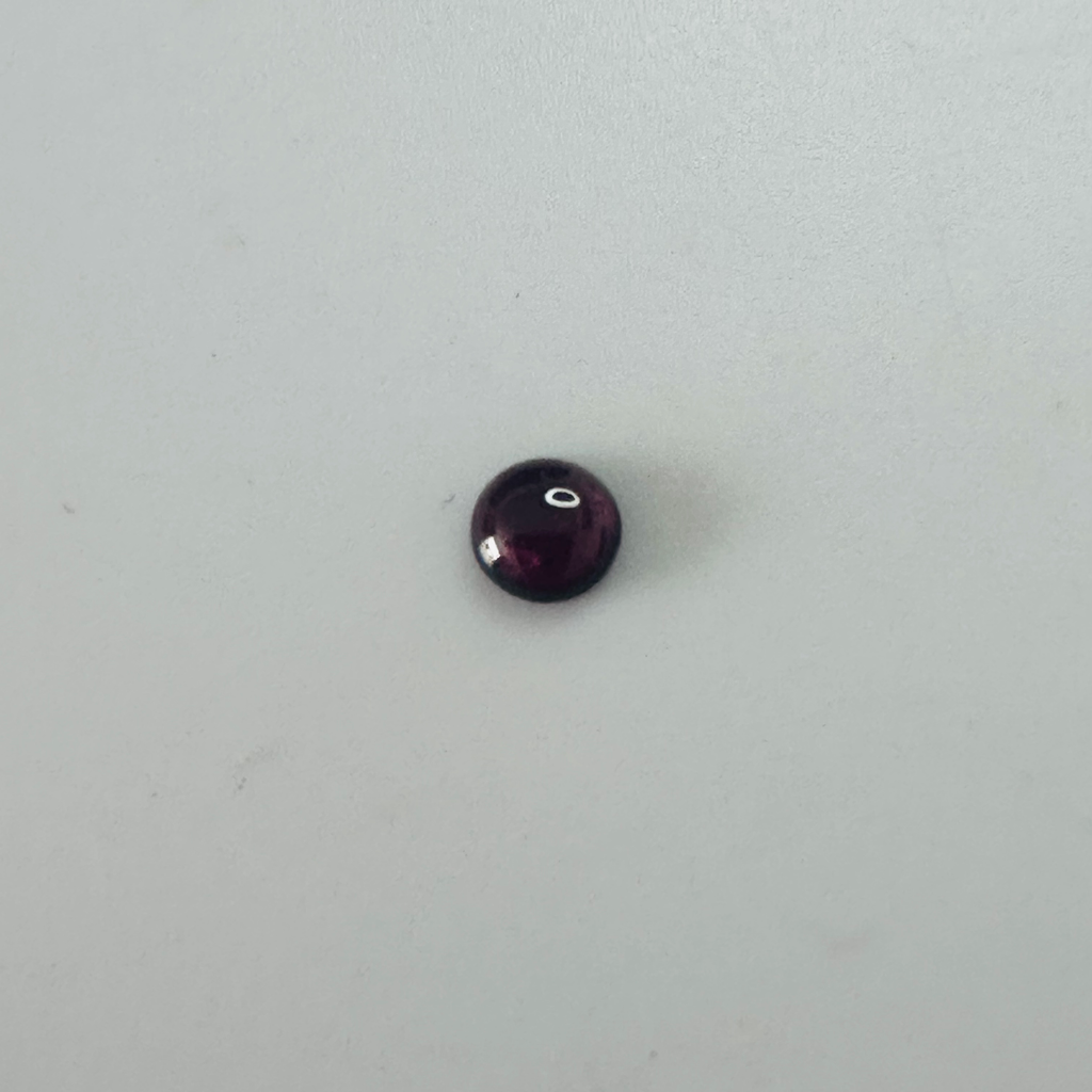 GARNET ROUND CAB 5MM.  0.53CTS image 3