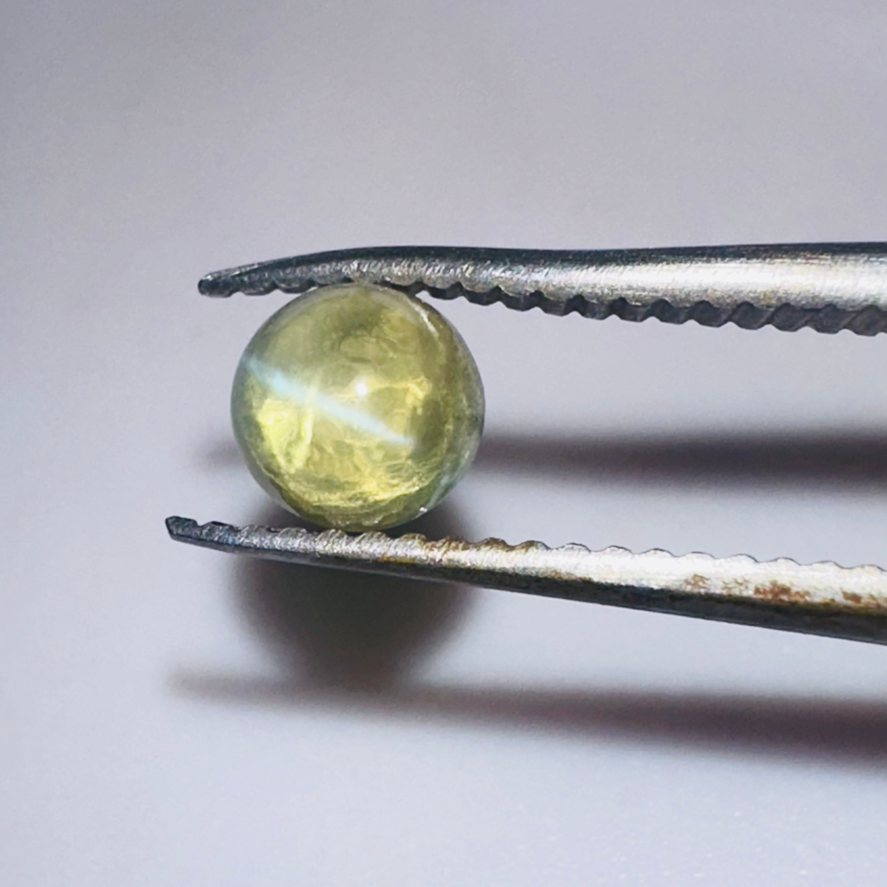 CHRYSOBERYL CATS EYE 5MM ROUND  0.80CTS image 0