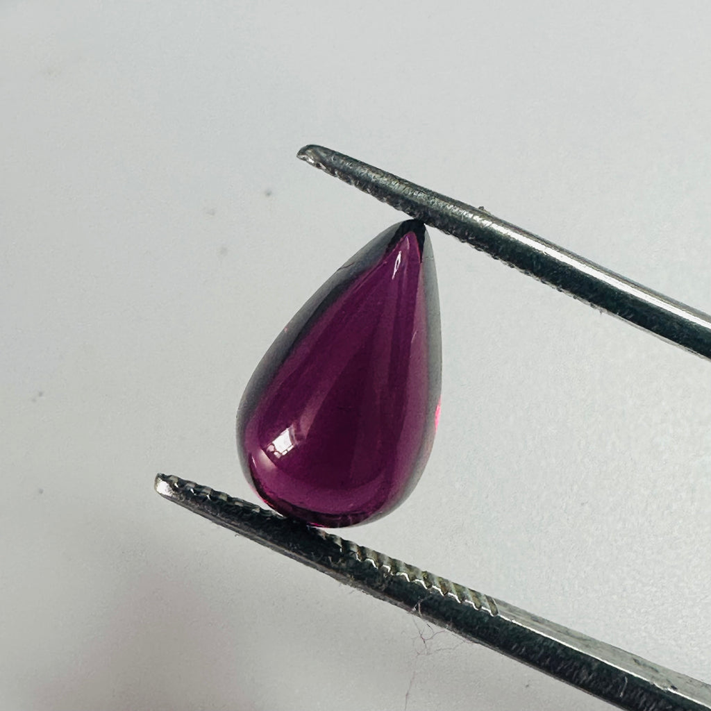GARNET CAB DROP 12MMX7MM  4.06CTS PURPLE image 1