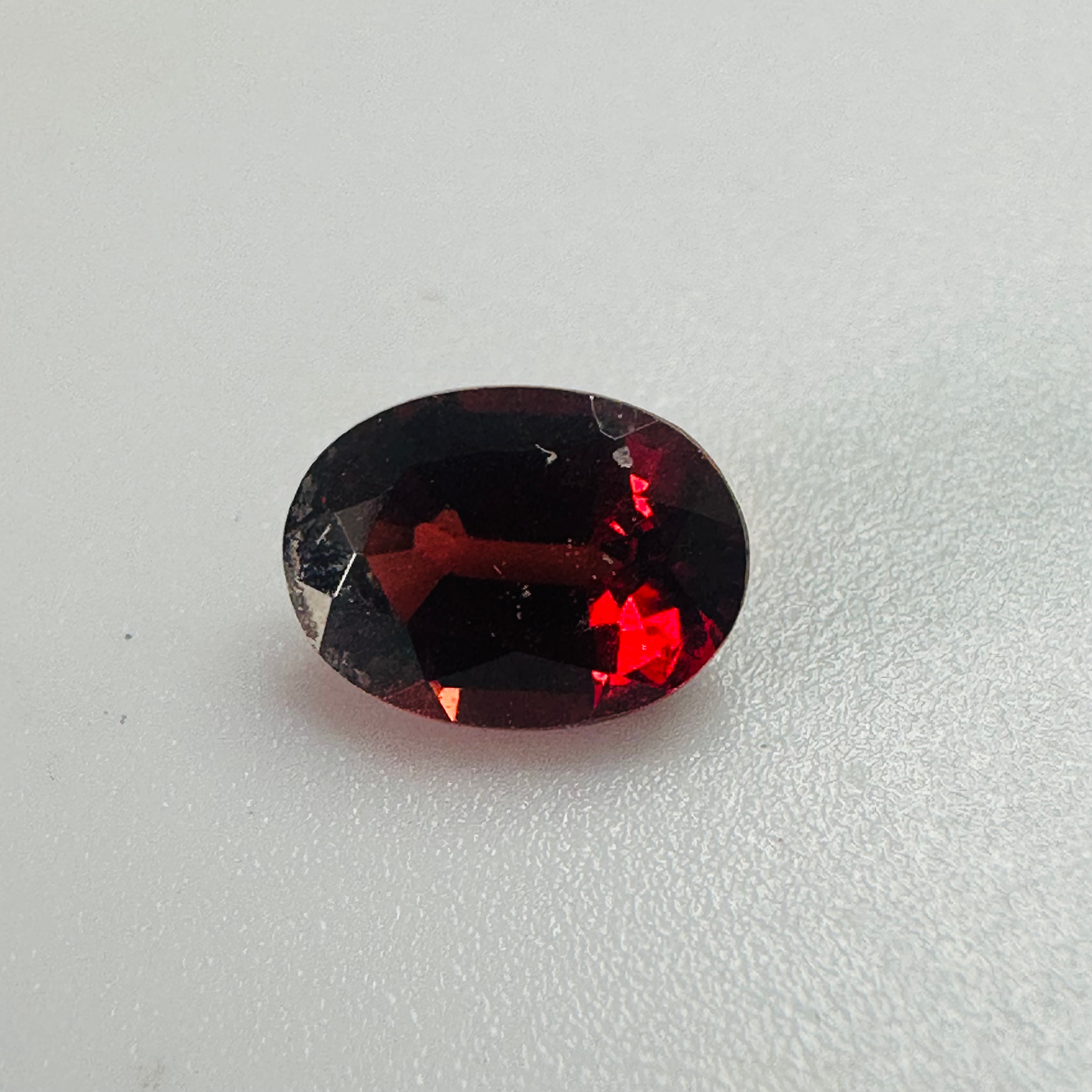 GARNET OVAL 7MMX5MM 1.12CTS image 1