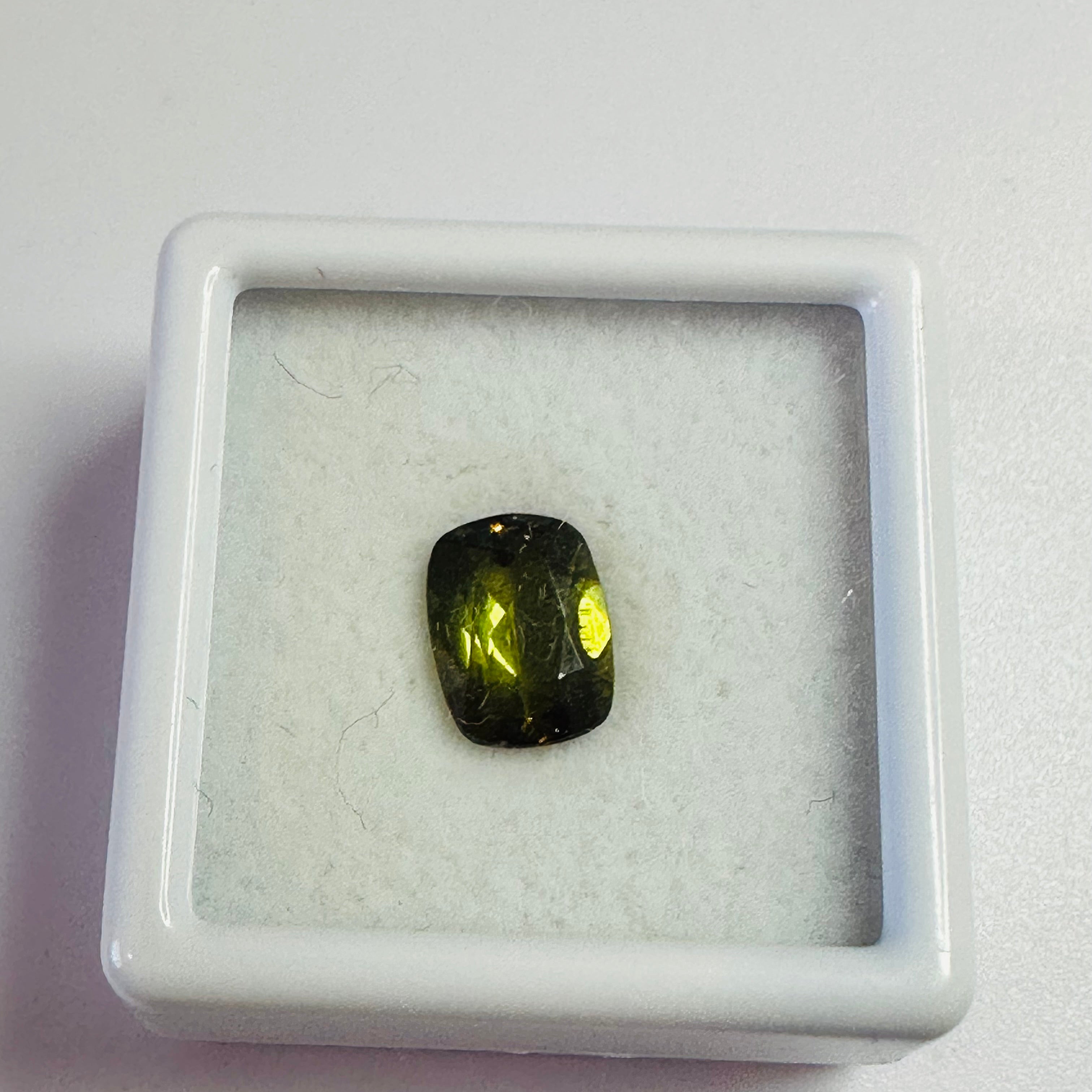 ANDALUSITE  TRAP CUT 8.5MMX6.5MM.  1.47CTS GREEN TO RED image 3