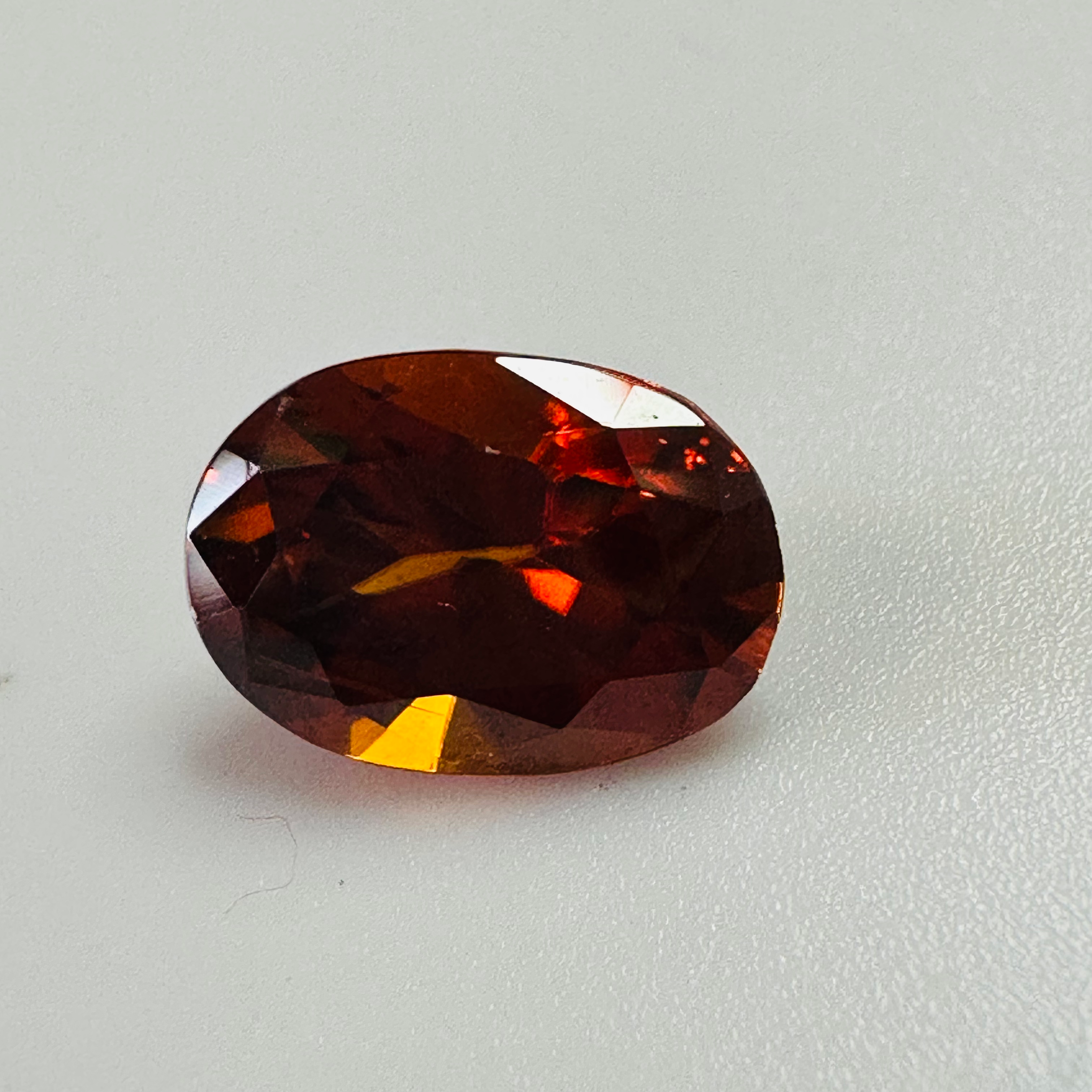 ZIRCON ORANGE OVAL 10.8MMX7.7MM  3.83CTS image 2