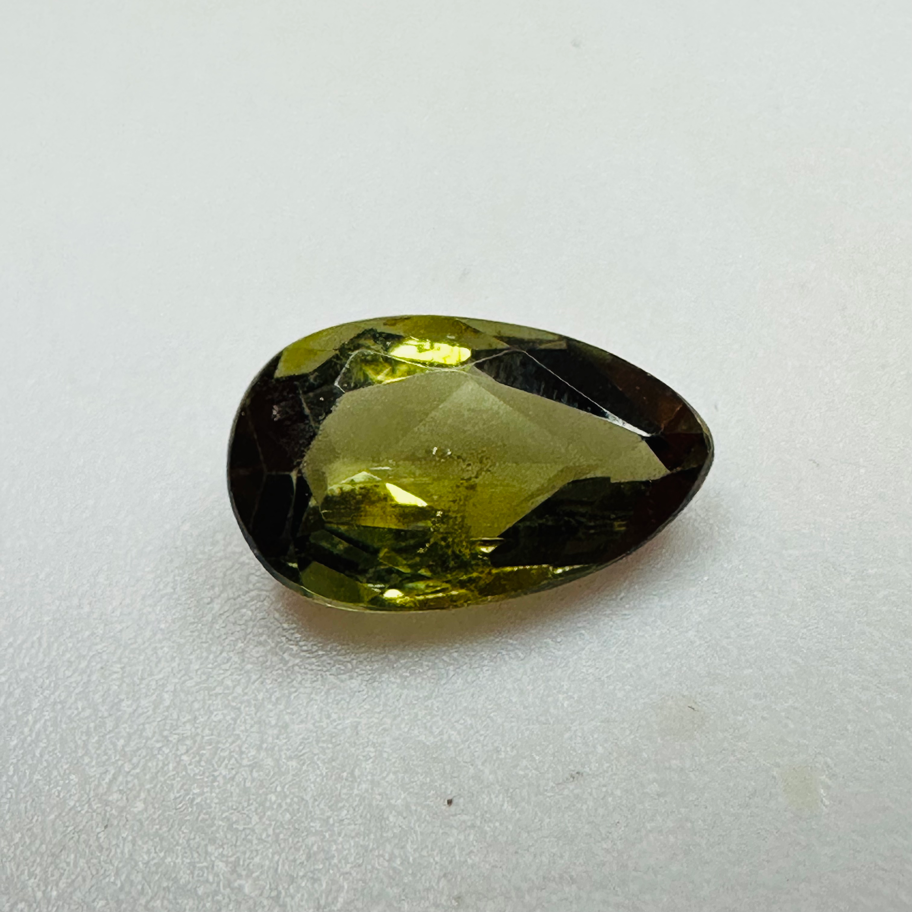 ANDALUSITE DROP  9MMX5MM.  1.24CTS GREEN TO RED image 0