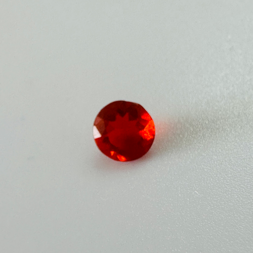 CHERRY RED FIRE OPAL ROUND 4.9MM ROUND  0.25CTS image 1