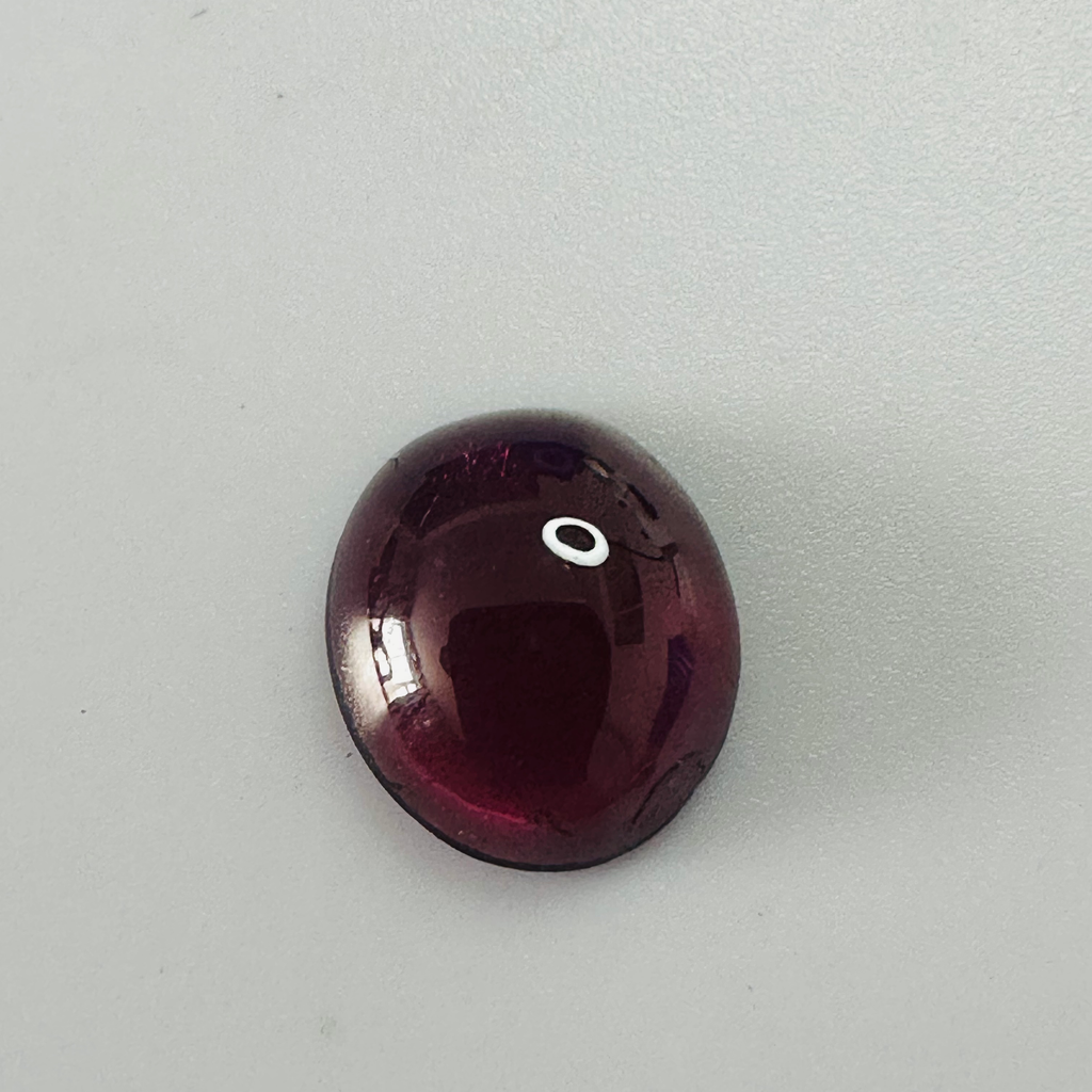 GARNET OVAL CAB 11MMX9.5MM 3.63CTS image 2