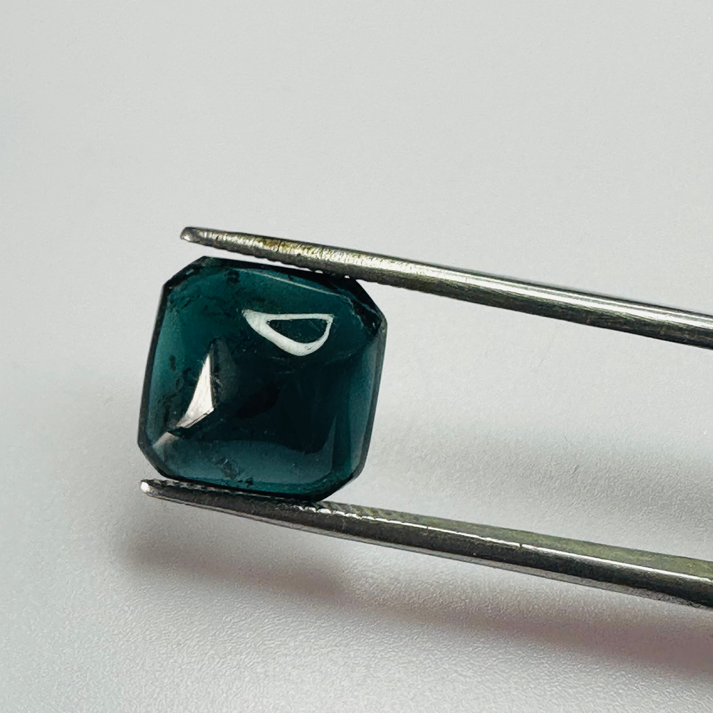 TOURMALINE BLUE 10.7MMX10.7MM  4.81CTS CARBUNCKLED image 0