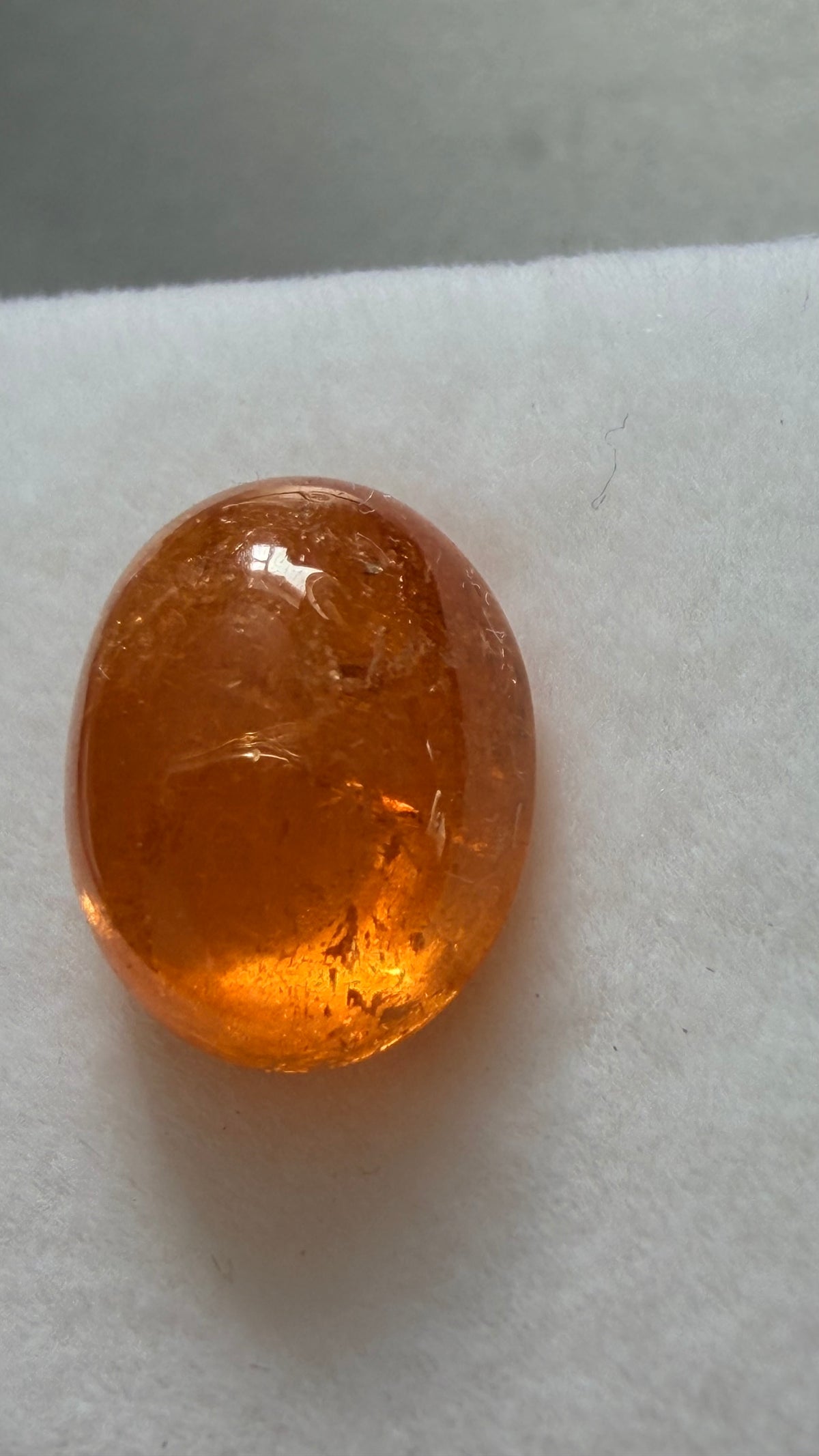 Mandarin Garnet Oval Cabochon 10mm × 8.1mm 4.12cts