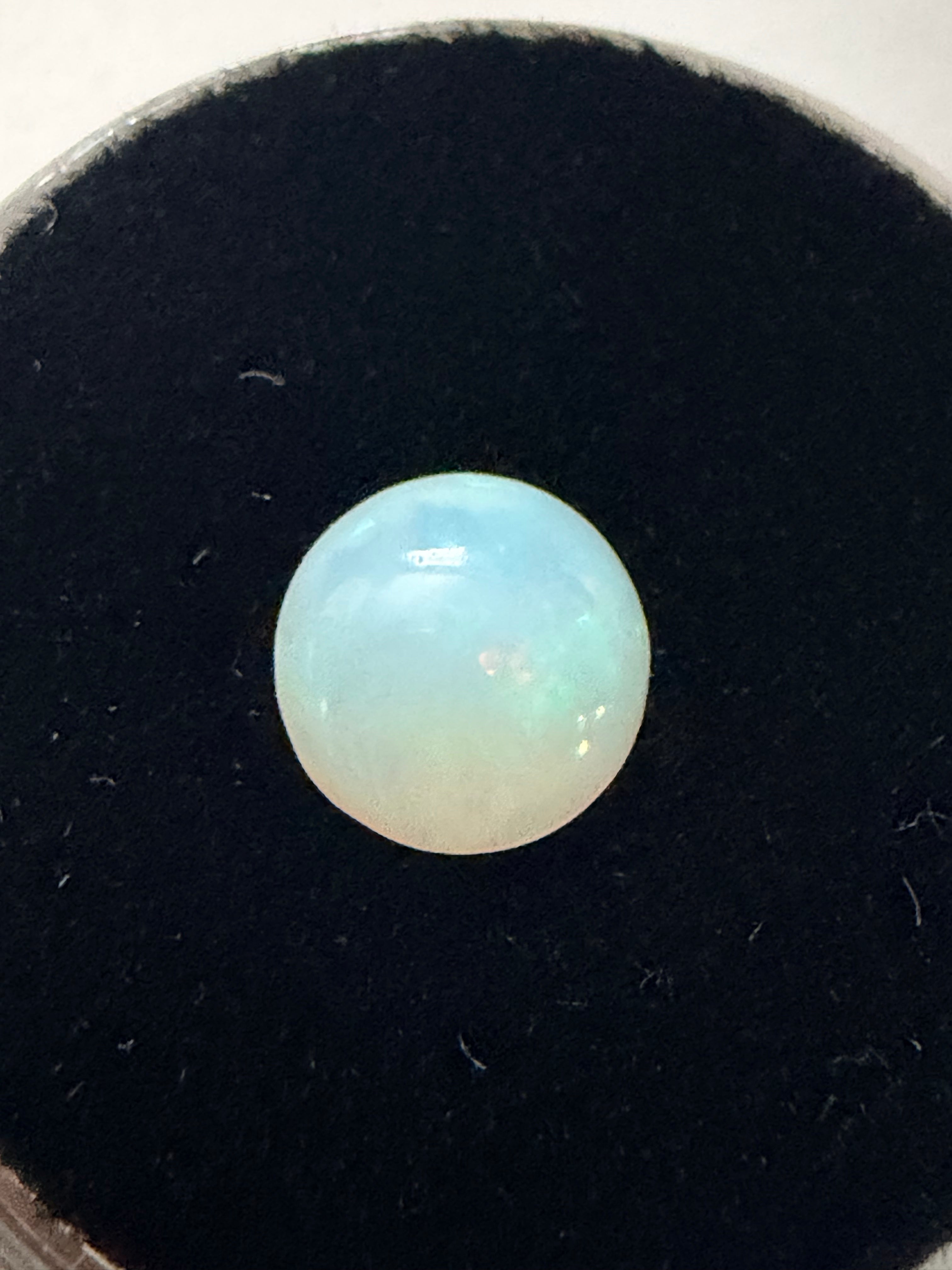 Opal Round 6.9mm 0.57ct with Play of Colour