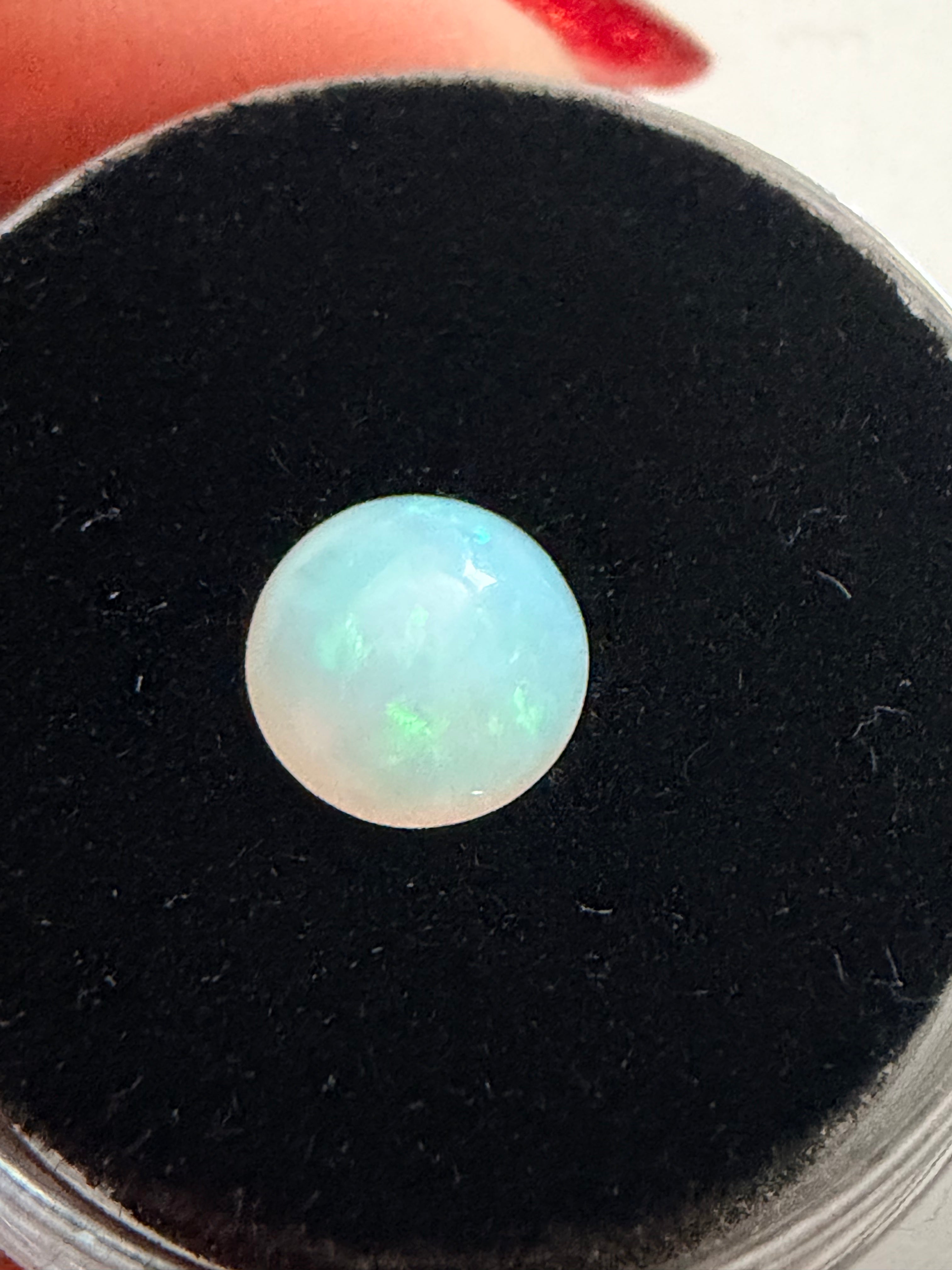 Opal Round 6.9mm 0.57ct with Play of Colour