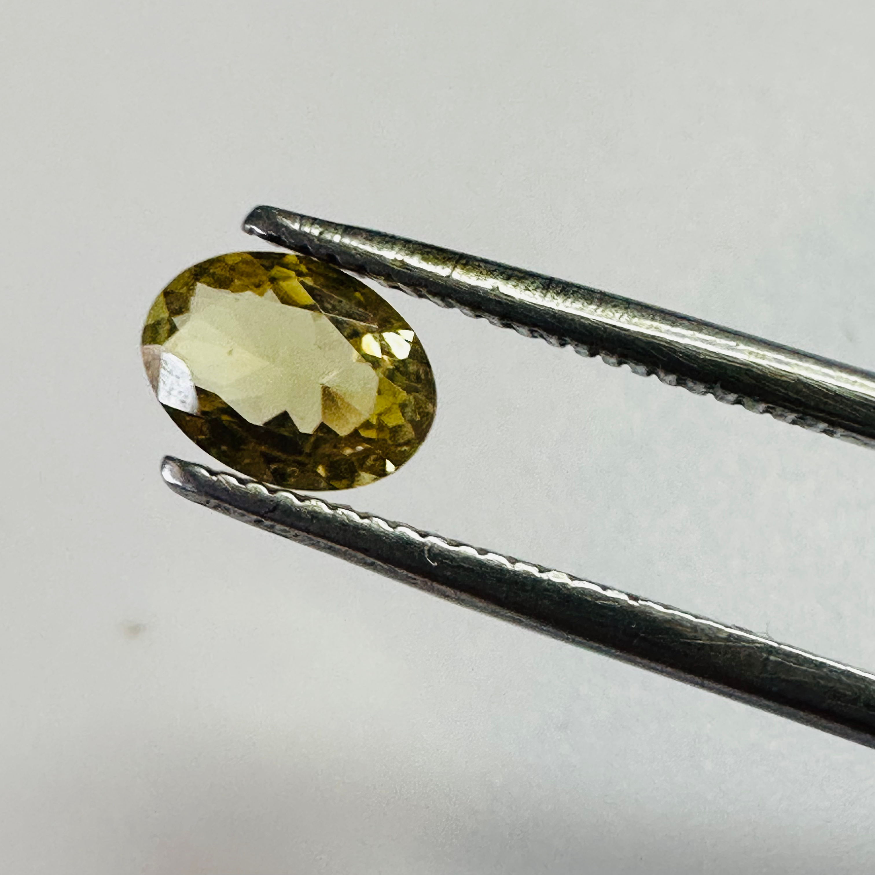 TOURMALINE YELLOW OVAL 6.6MMX4.8MM  0.62CTS image 2
