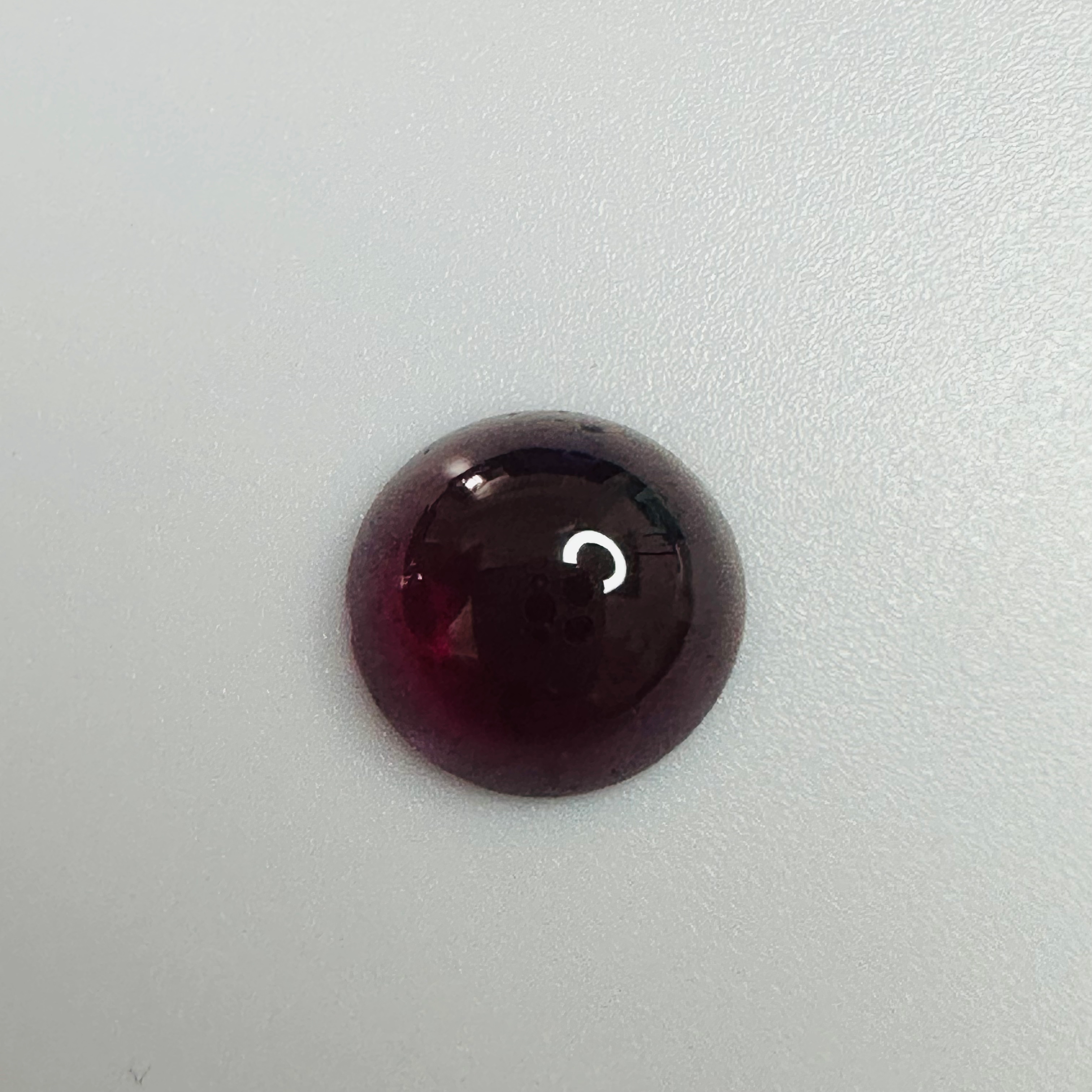 GARNET ROUND CAB 9.8MM 3.58CTS image 3