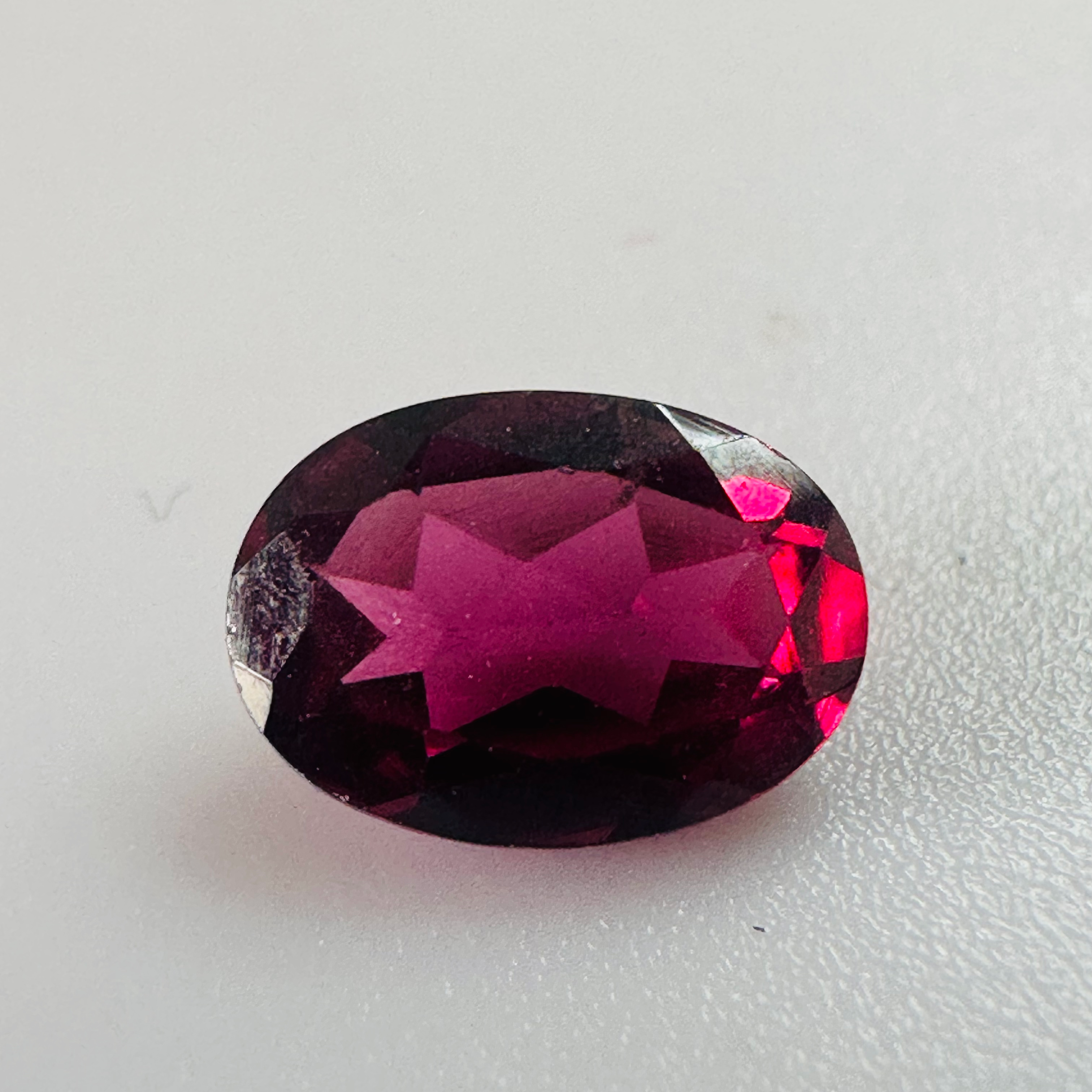 GARNET  OVAL 7MMX5MM  0.96CTS PURPLE image 1