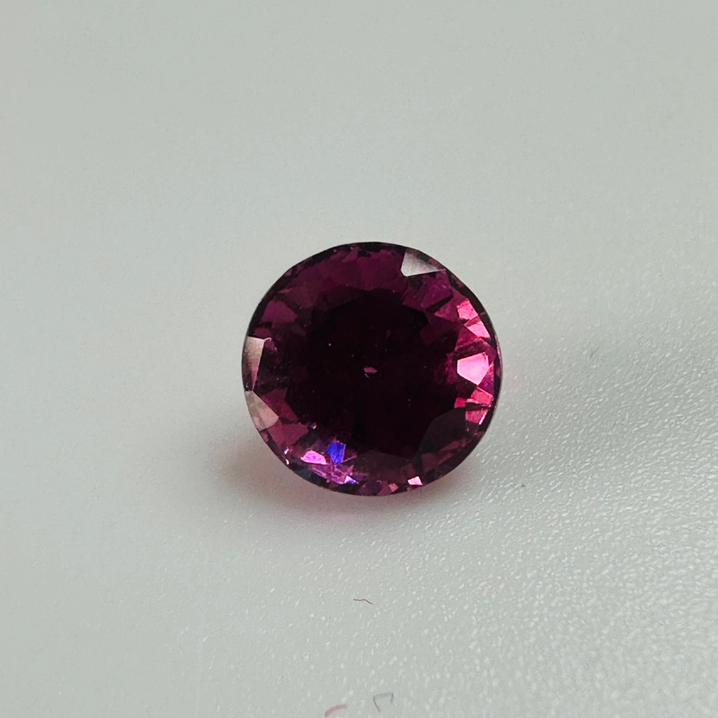 GARNET PURPLE ROUND 6.7MM  1.58CTS image 0