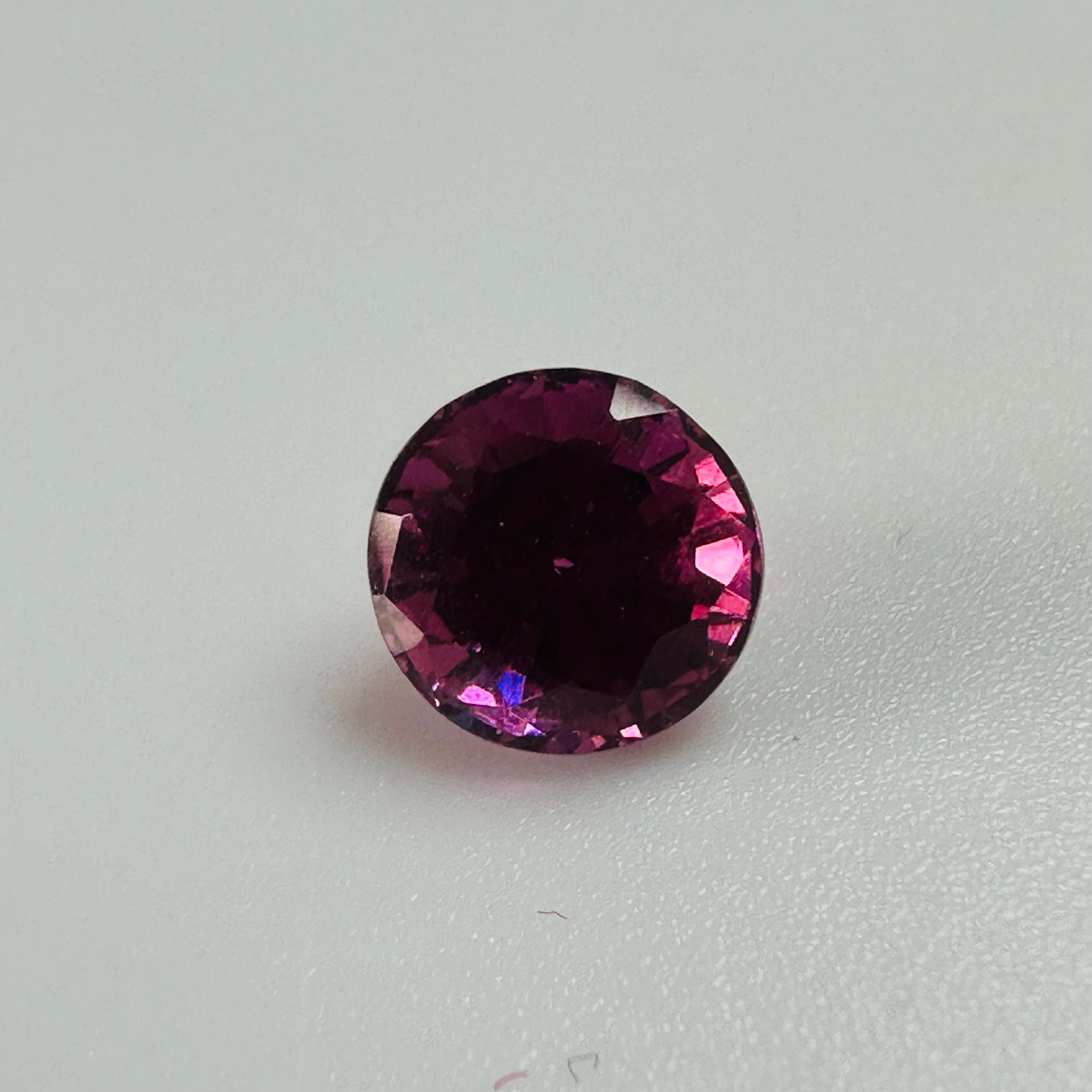 GARNET PURPLE ROUND 6.7MM  1.58CTS image 0