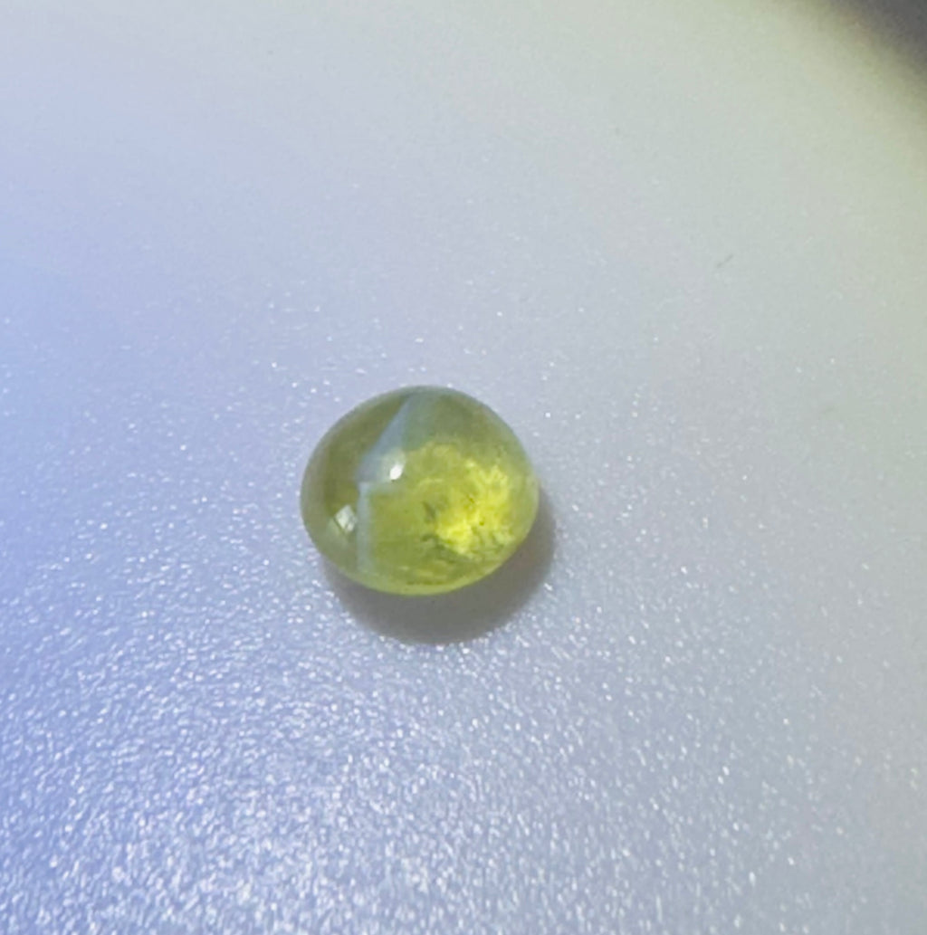 CHRYSOBERYL CATS EYE 5MM ROUND  0.80CTS image 1