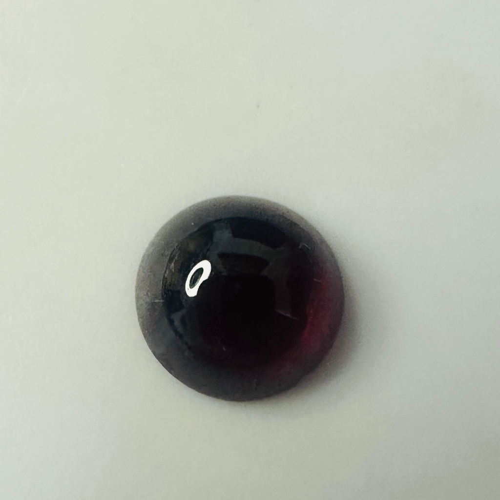 GARNET ROUND CAB 9.8MM 3.58CTS image 6