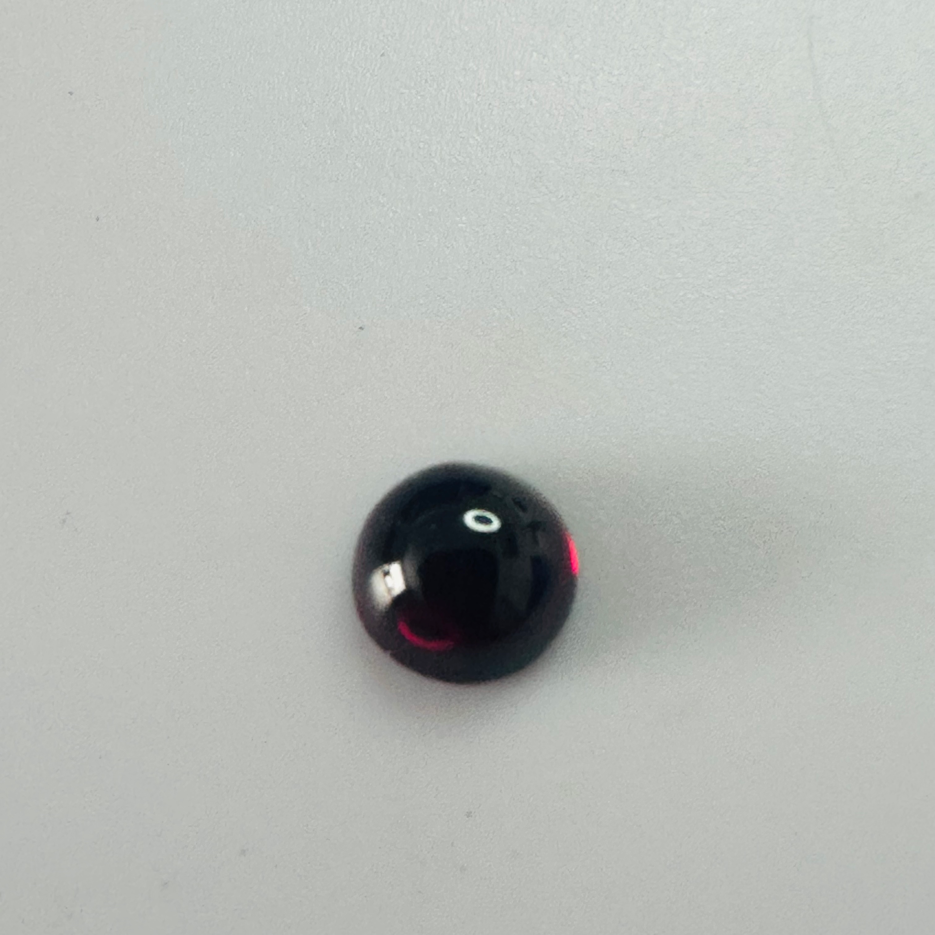 GARNET ROUND CAB 7MM.  1.96CTS image 2