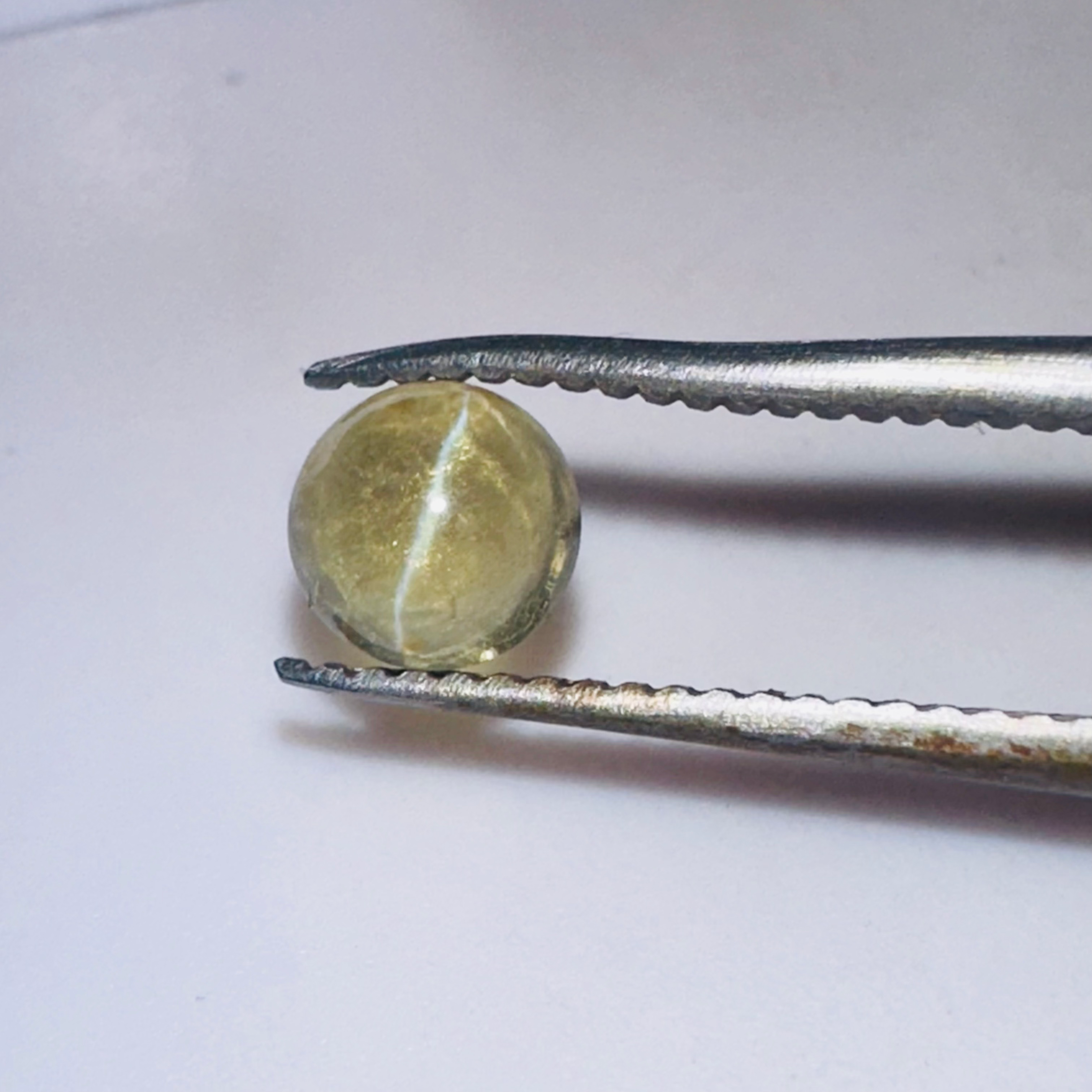 CHRYSOBERYL CATS EYE 5.3MM ROUND  0.80CTS image 0