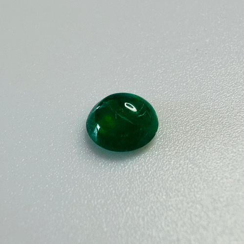 EMERALD ROUND CAB 5MM. 0.47CTS image 1