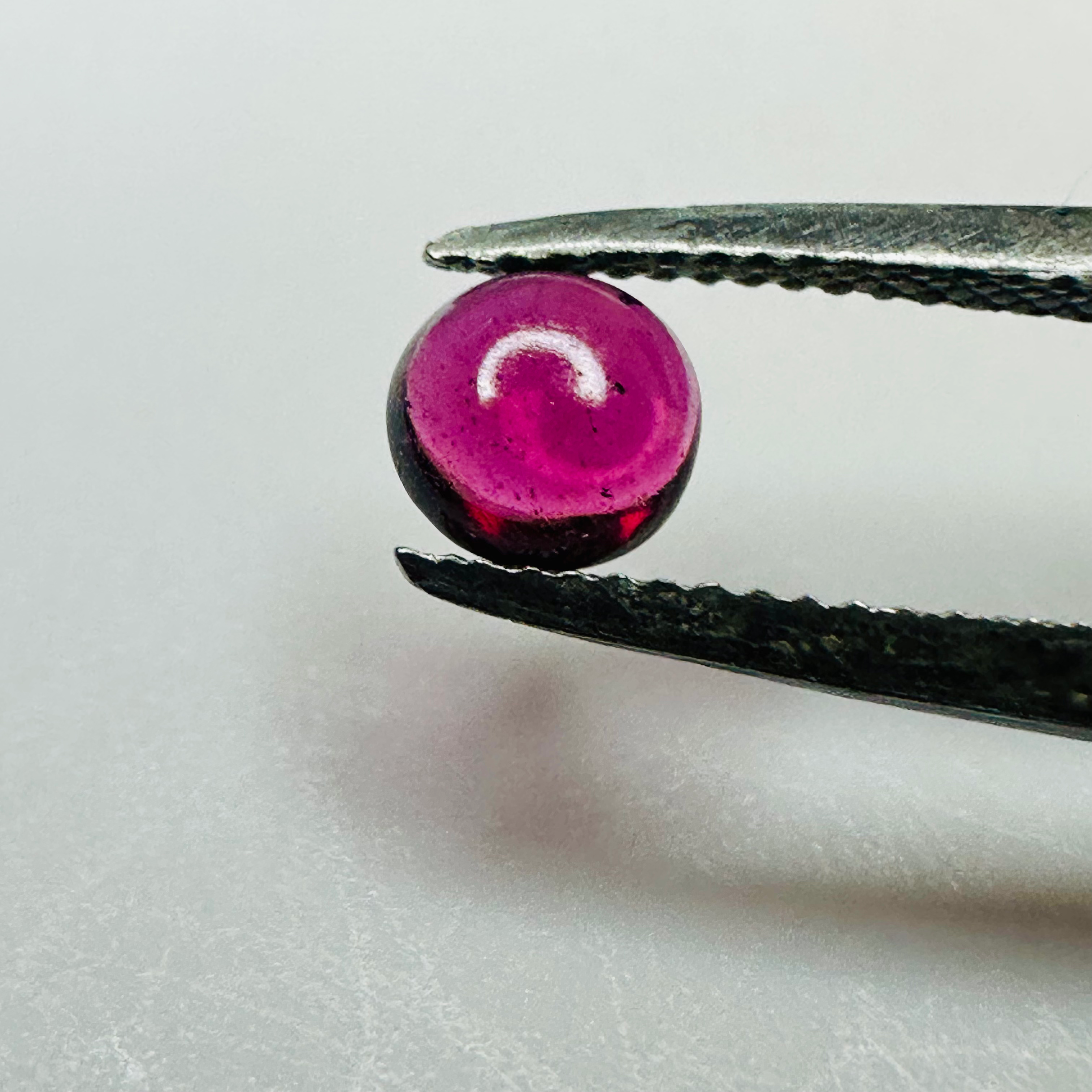 GARNET ROUND CAB 5MM.  0.53CTS image 0