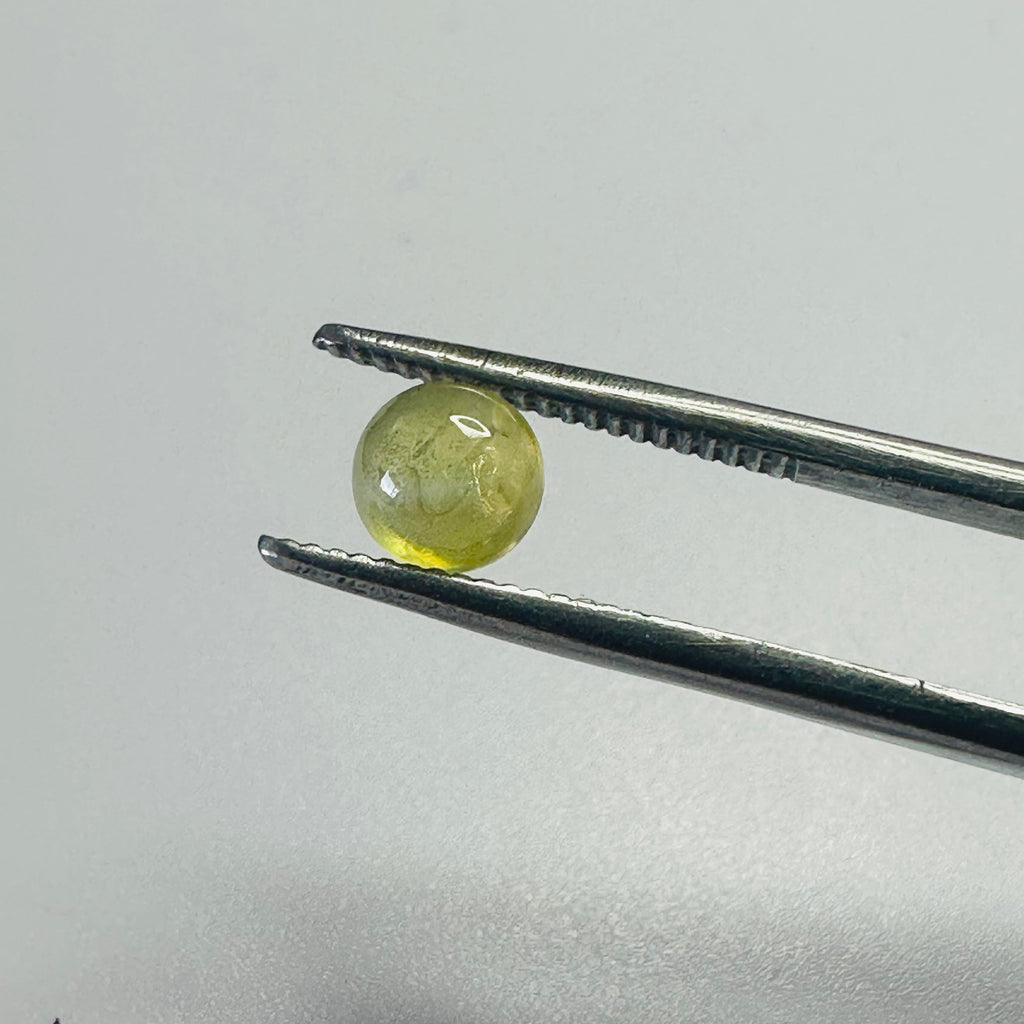 CHRYSOBERYL CATS EYE 5MM ROUND  0.80CTS image 5