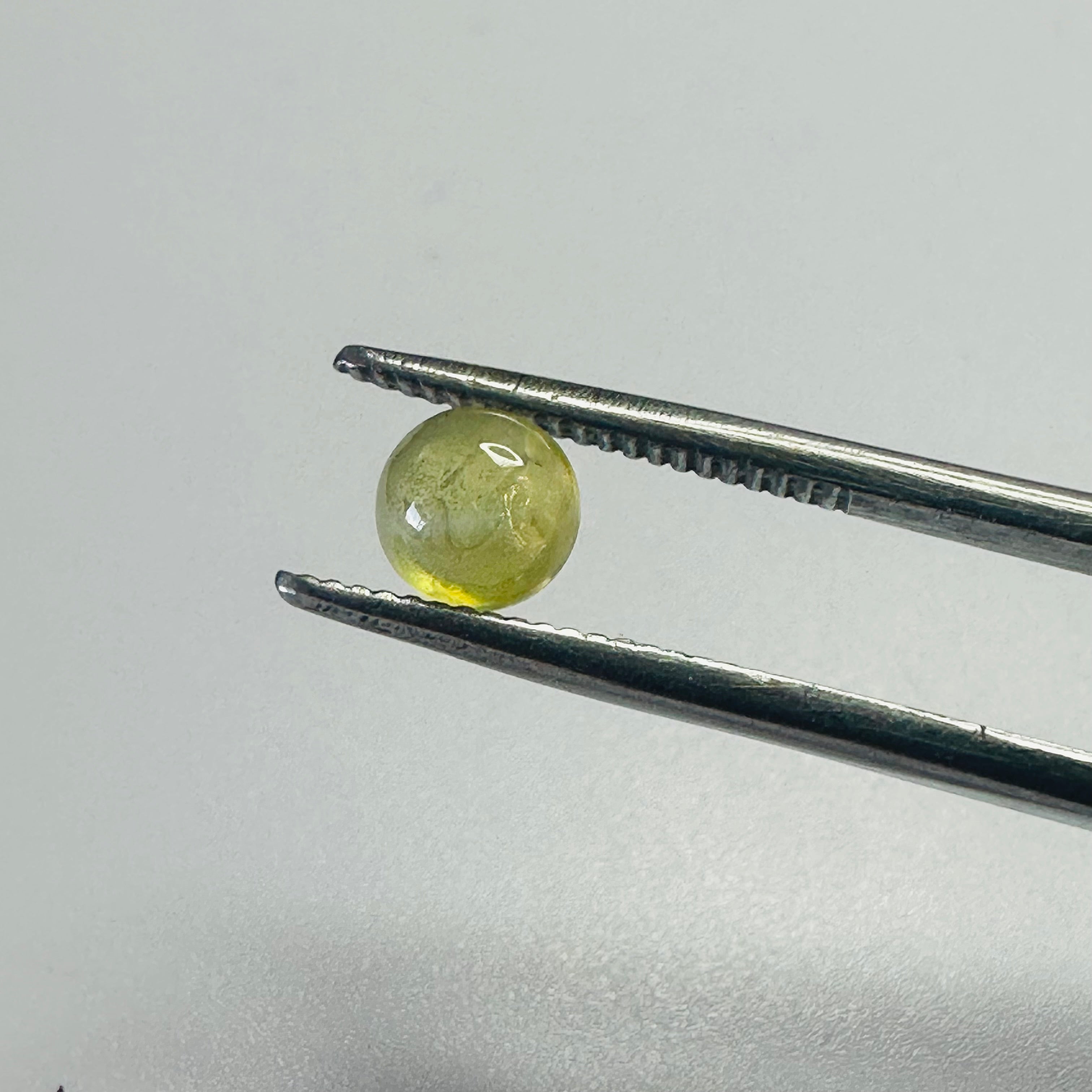 CHRYSOBERYL CATS EYE 5MM ROUND  0.80CTS image 5