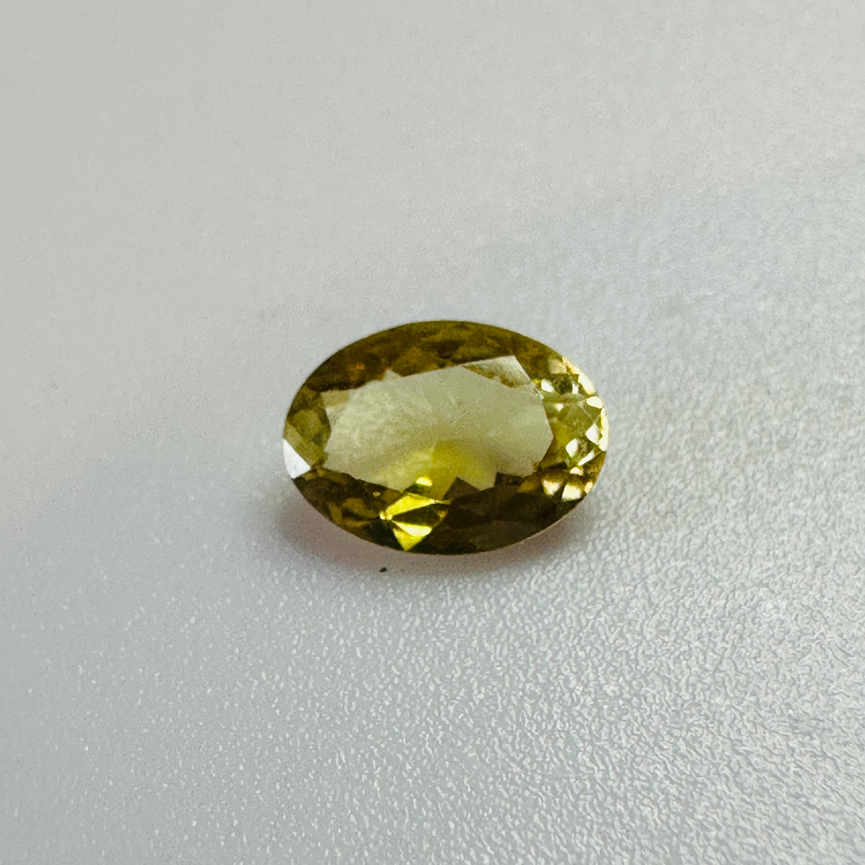 TOURMALINE YELLOW OVAL 6.6MMX4.8MM  0.62CTS image 0