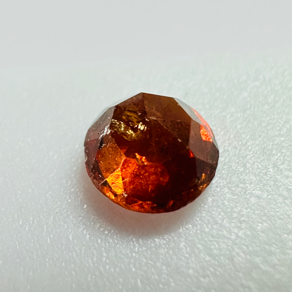GARNET  ROUND 4.4MM  0.43CTS ORANGE image 2