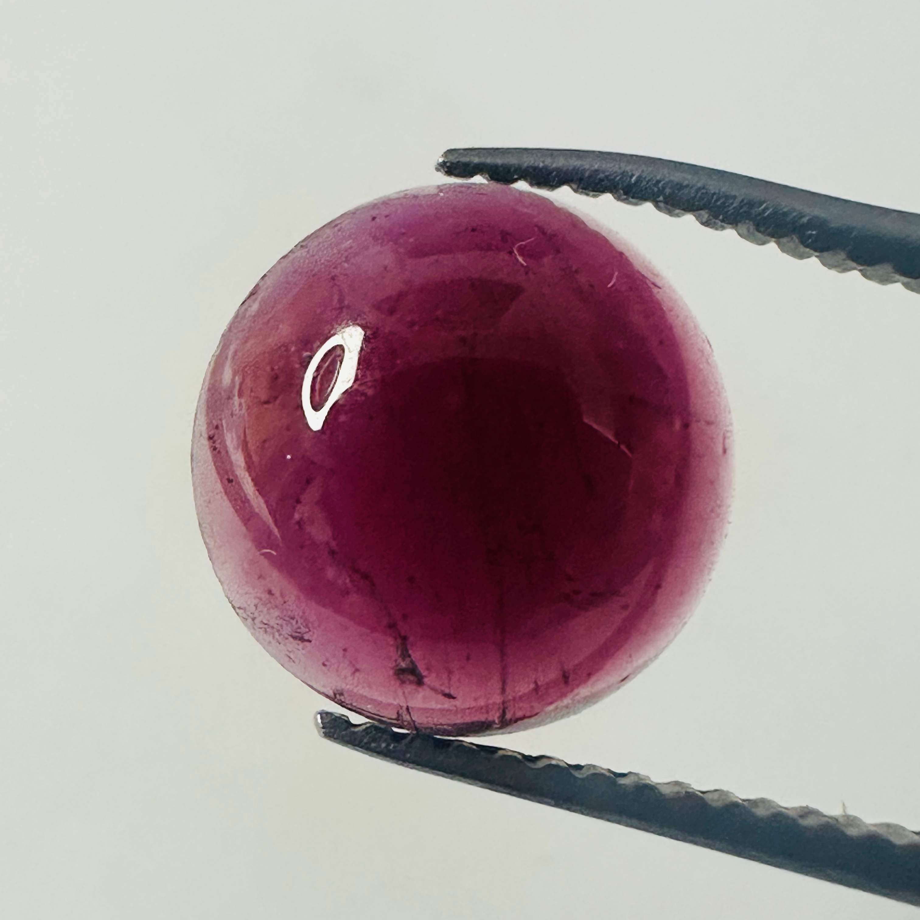 GARNET ROUND CAB 9.8MM 3.58CTS image 0