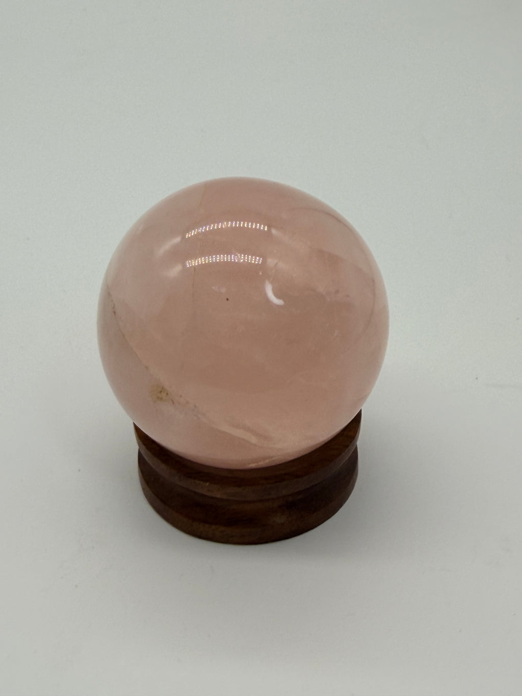 Rose quartz sphere on wood stand 45mm image 1